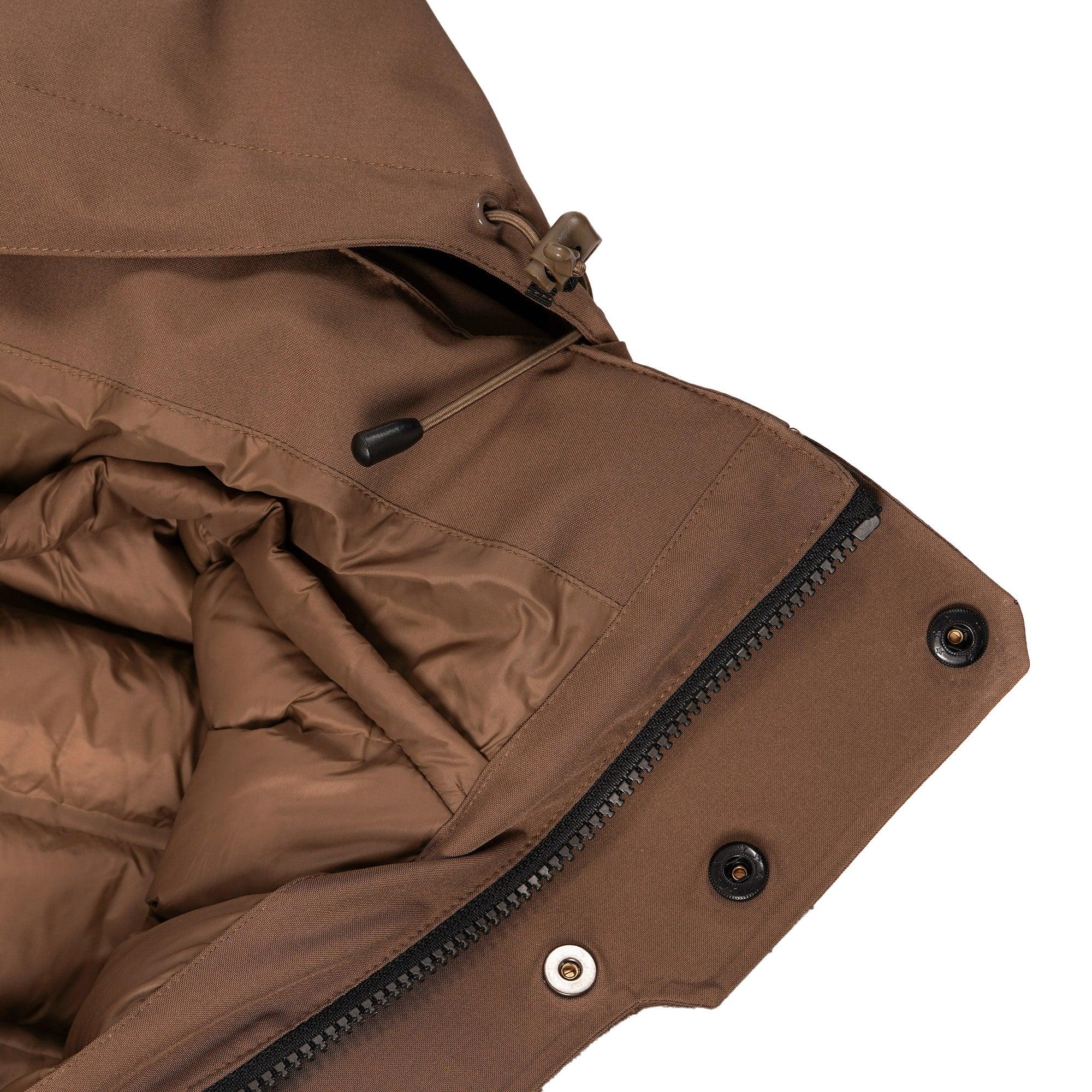 Brown insulated jacket close-up showing zipper, snap buttons, and drawstring details