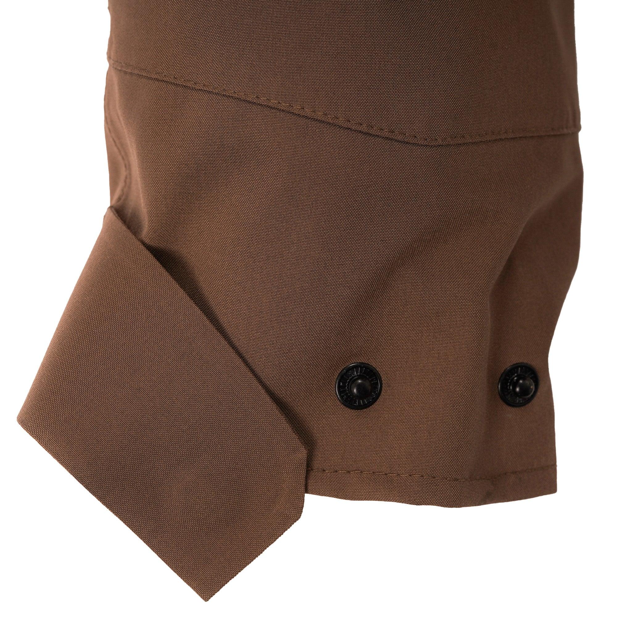 Brown shirt cuff with black buttons and stitched details, close-up