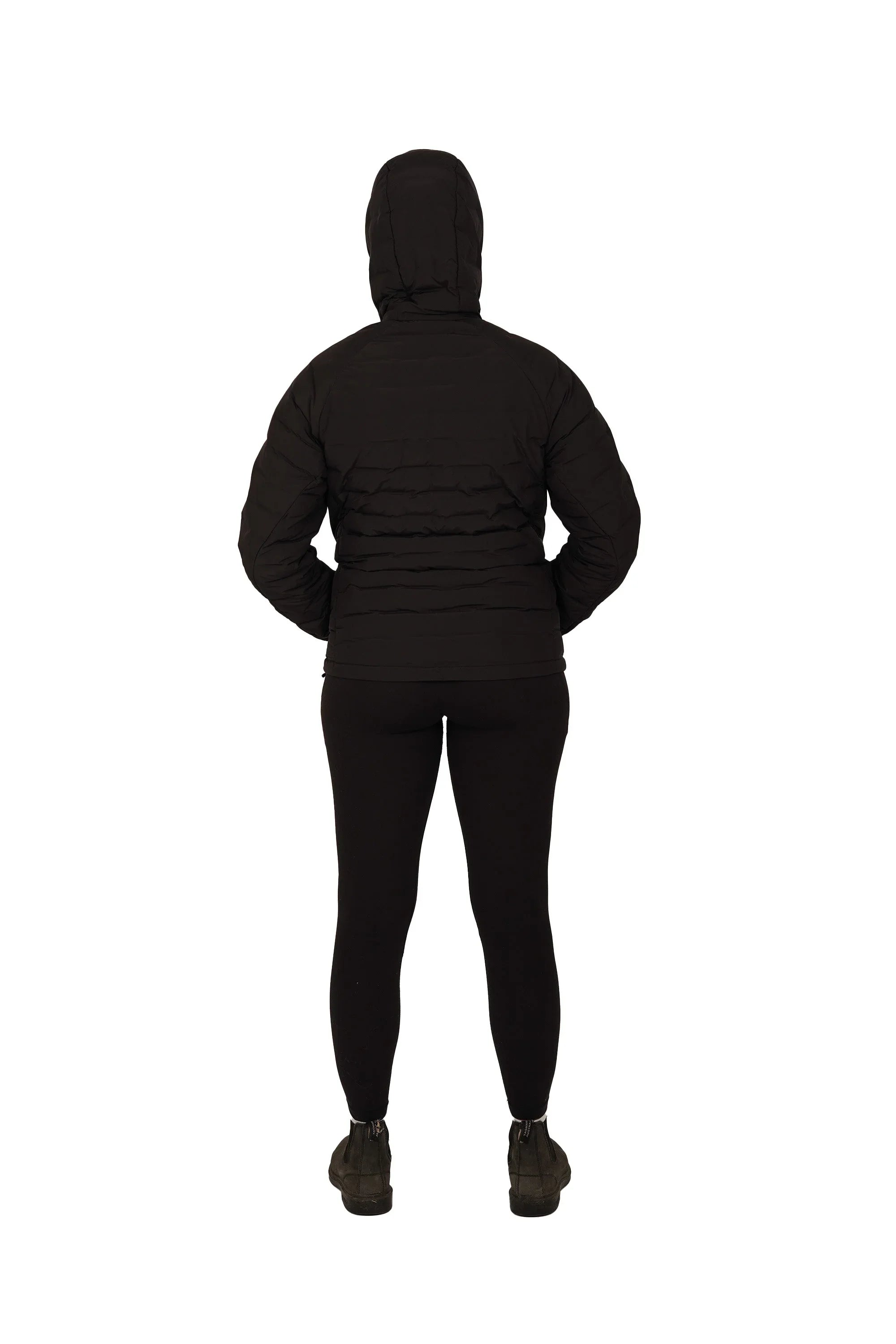 Back view of woman wearing black lightweight down hooded jacket and leggings