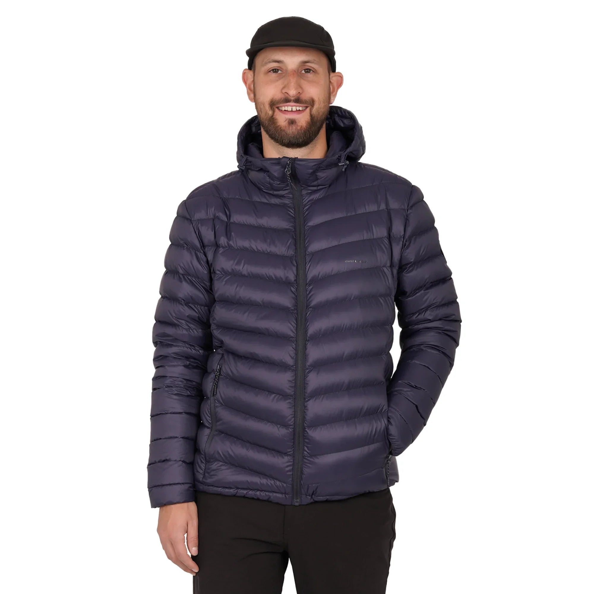 Man wearing navy blue puffer jacket and black cap on white background