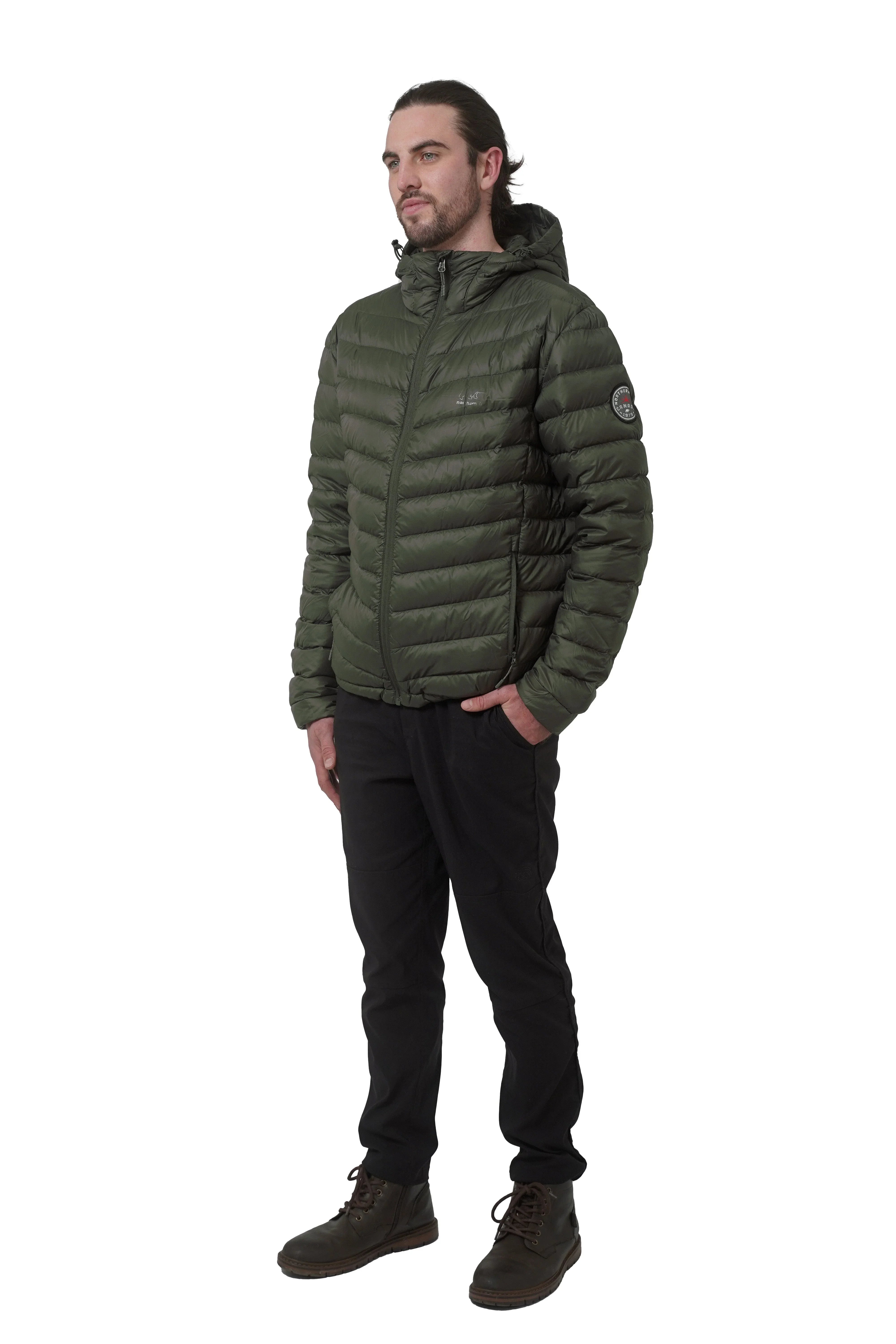Man wearing olive green lightweight packable down jacket with hood and black pants