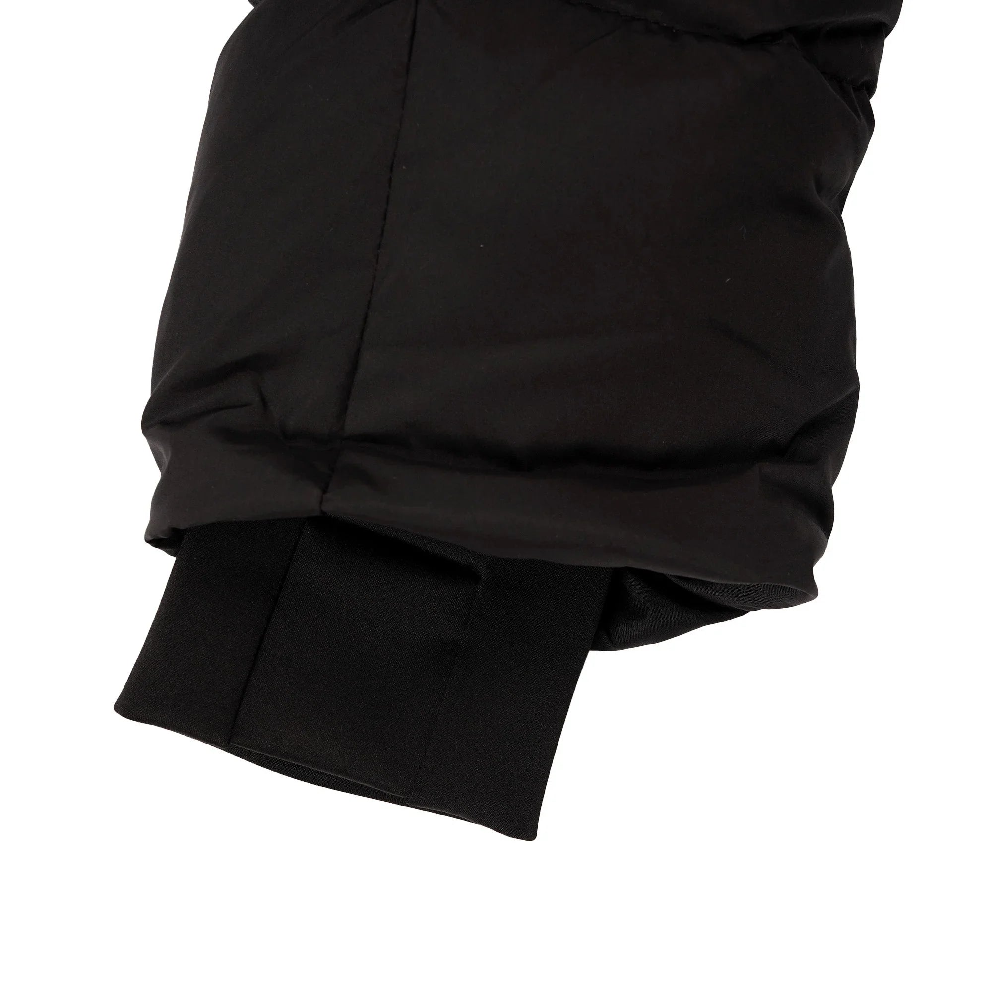 Black puffer jacket sleeve with ribbed cuff detail