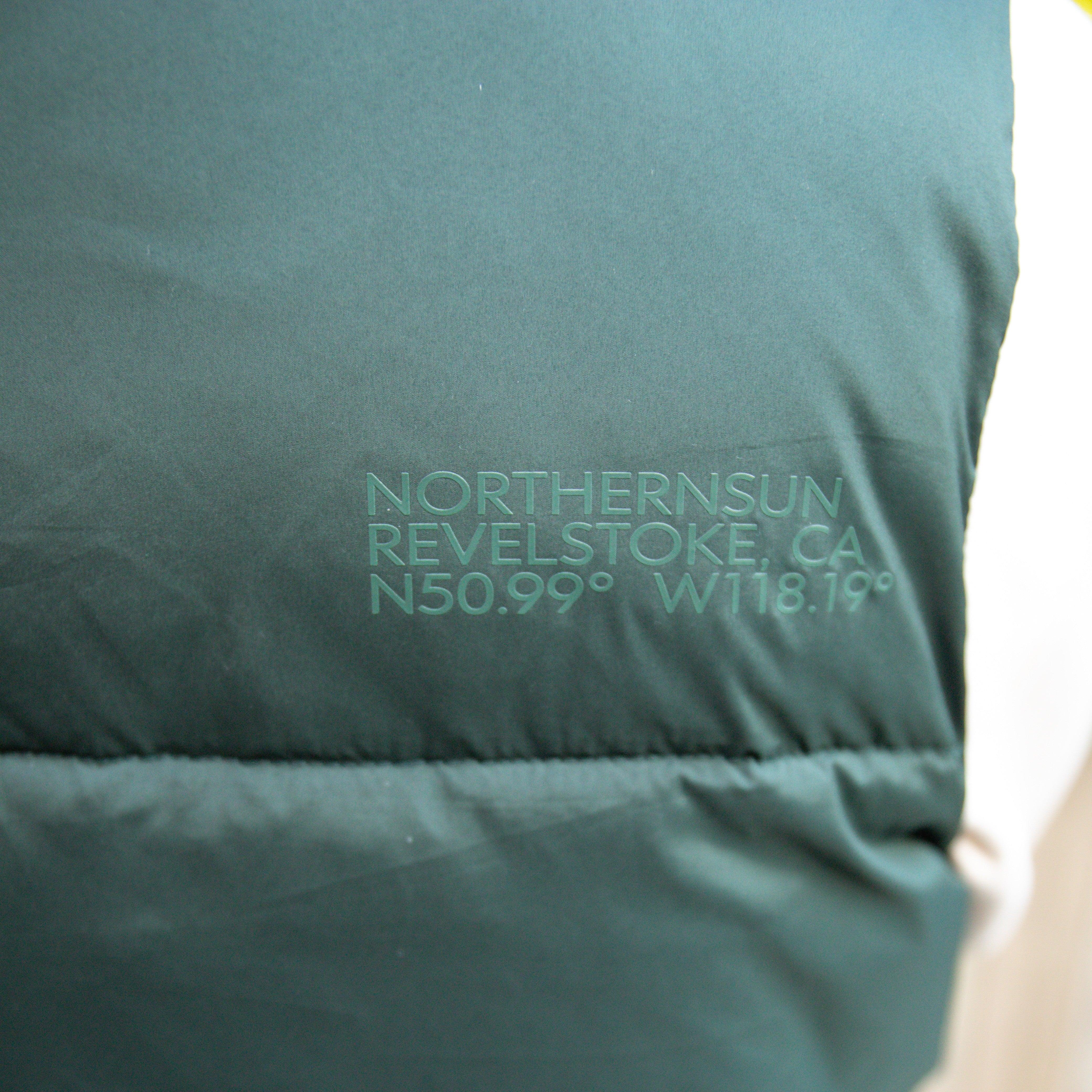 Close-up of women's green vest with 