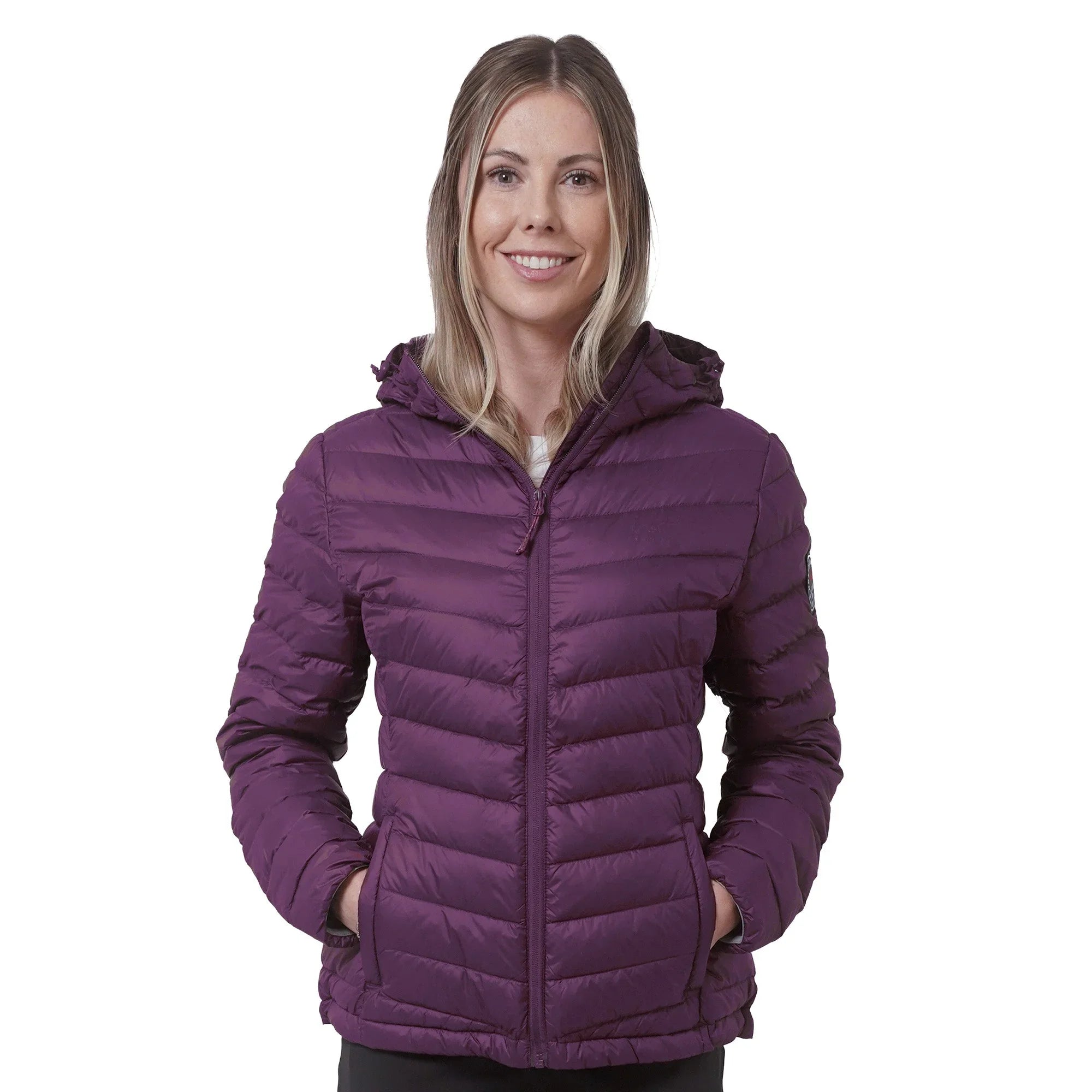 Woman wearing purple packable lightweight down jacket with hood, front view