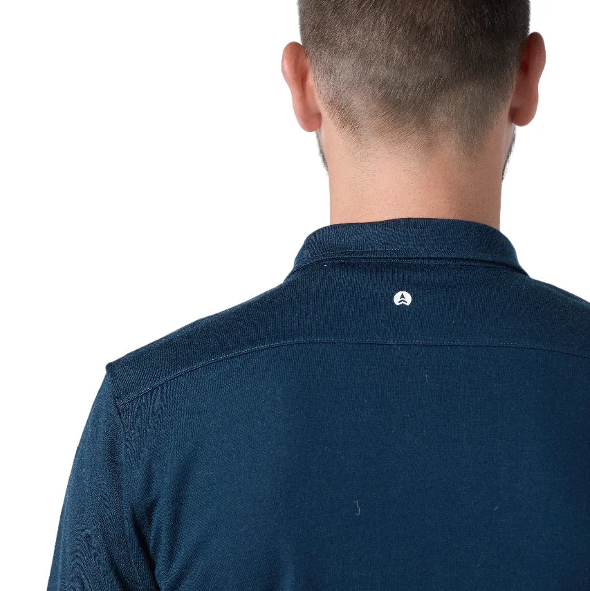 Back detail of a navy blue NorthWool Merino wool shacket with collar and small logo