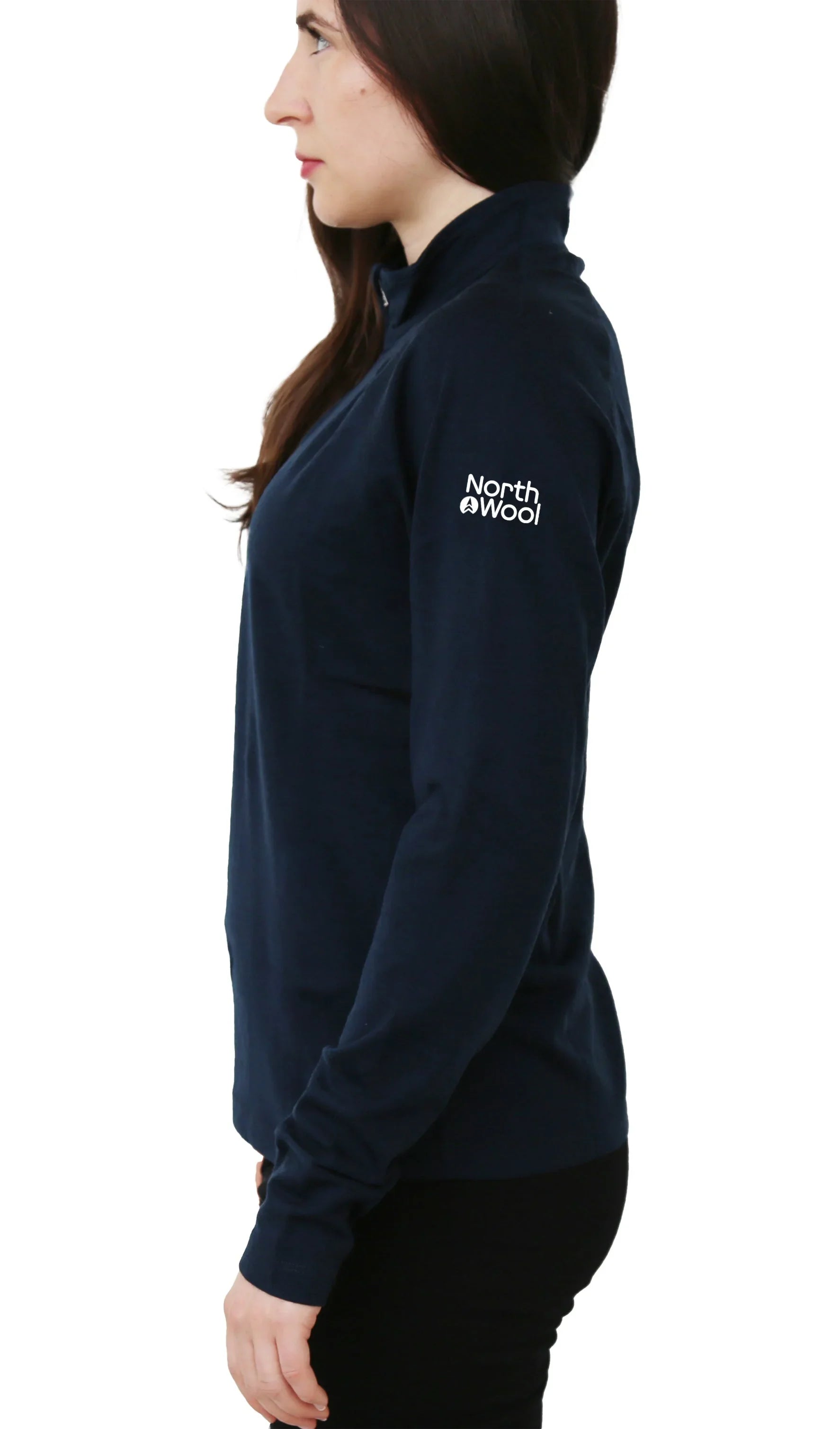 Woman wearing navy North Wool merino wool 1/4 zip baselayer pullover sweater side view