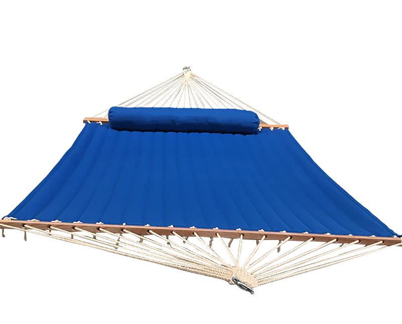 Blue double olefin hammock with pillow and wooden spreader bars