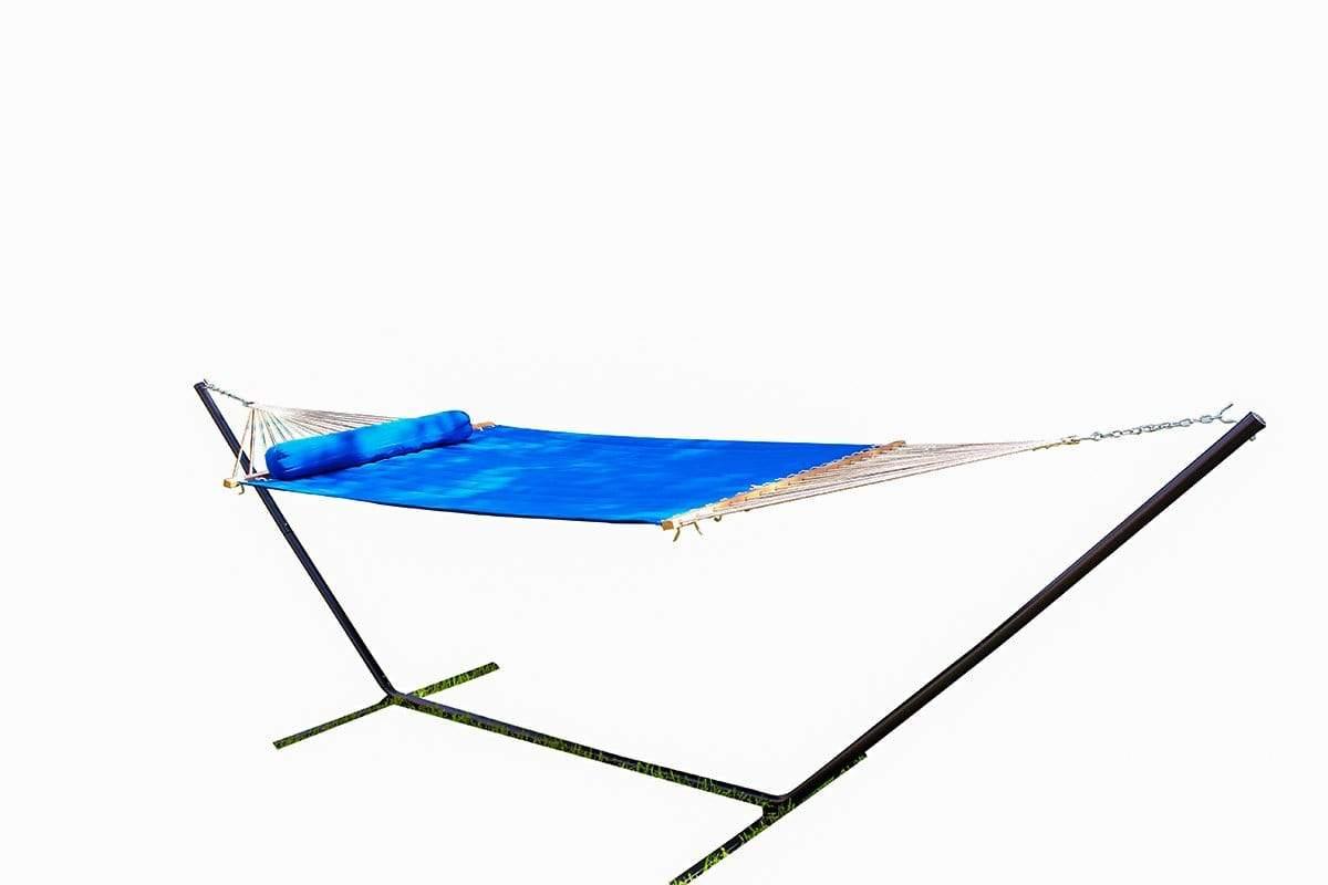 Blue quilted double hammock with pillow on black metal tri-beam stand, white background
