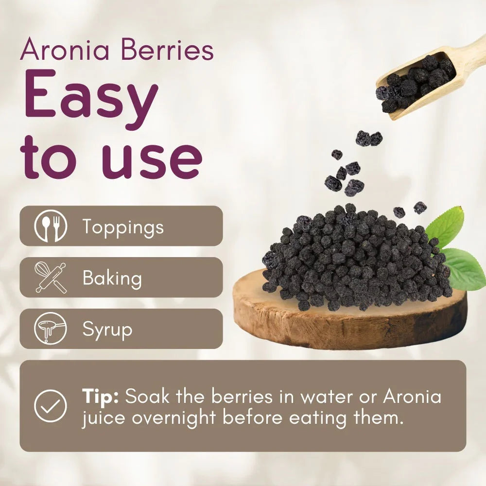 Pile of dried aronia berries on wood slice with scoop, easy to use for toppings, baking, syrup.