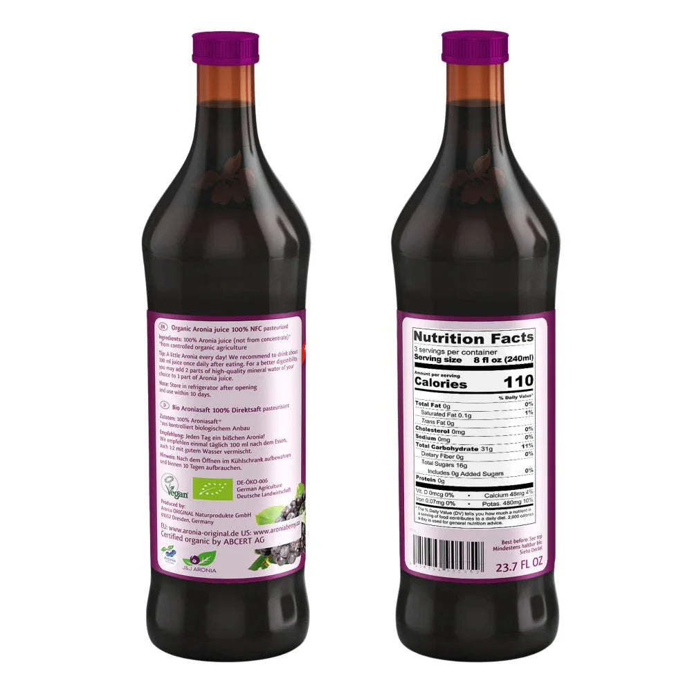 Two bottles of organic aronia juice with purple caps, nutrition facts and ingredient labels visible.