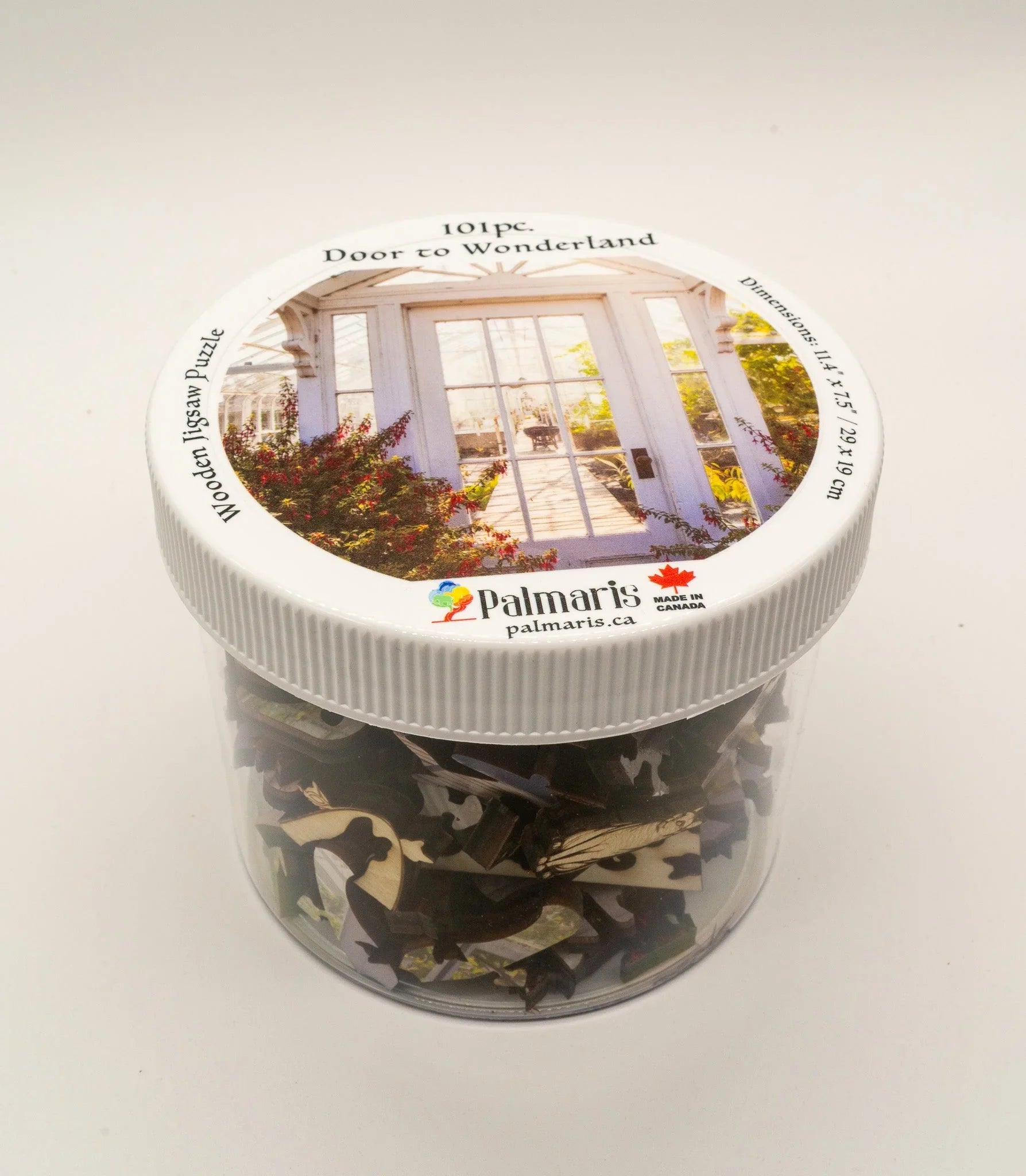 Palmaris Door to Wonderland 101-piece wooden jigsaw puzzle in clear plastic jar