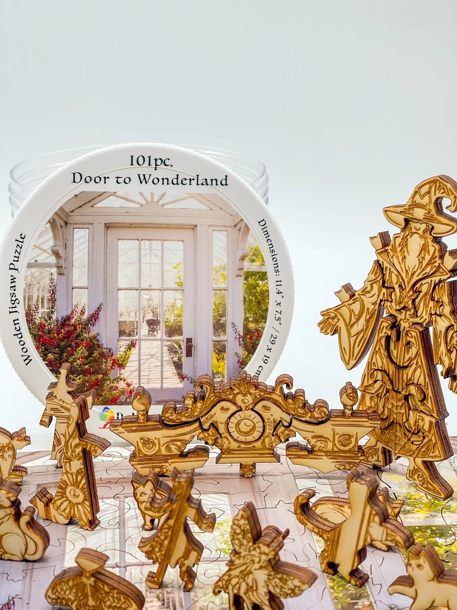 101-piece Door to Wonderland wooden jigsaw puzzle with intricate fantasy-shaped pieces