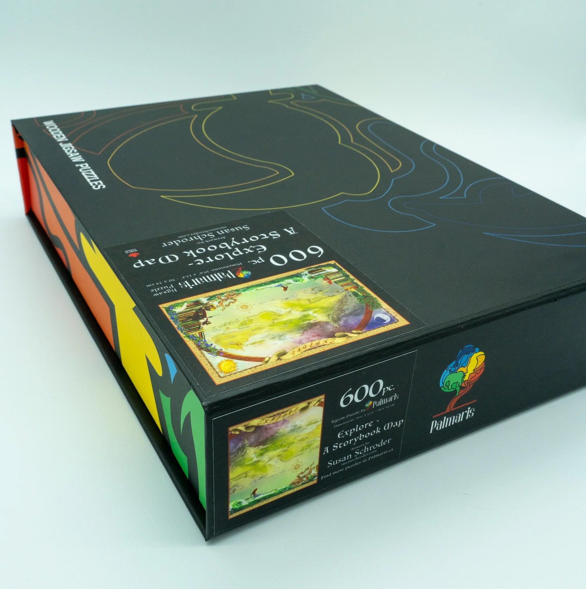 Palmaris 600-piece jigsaw puzzle box, Explorer A Storybook Map by Susan Schroder, black packaging