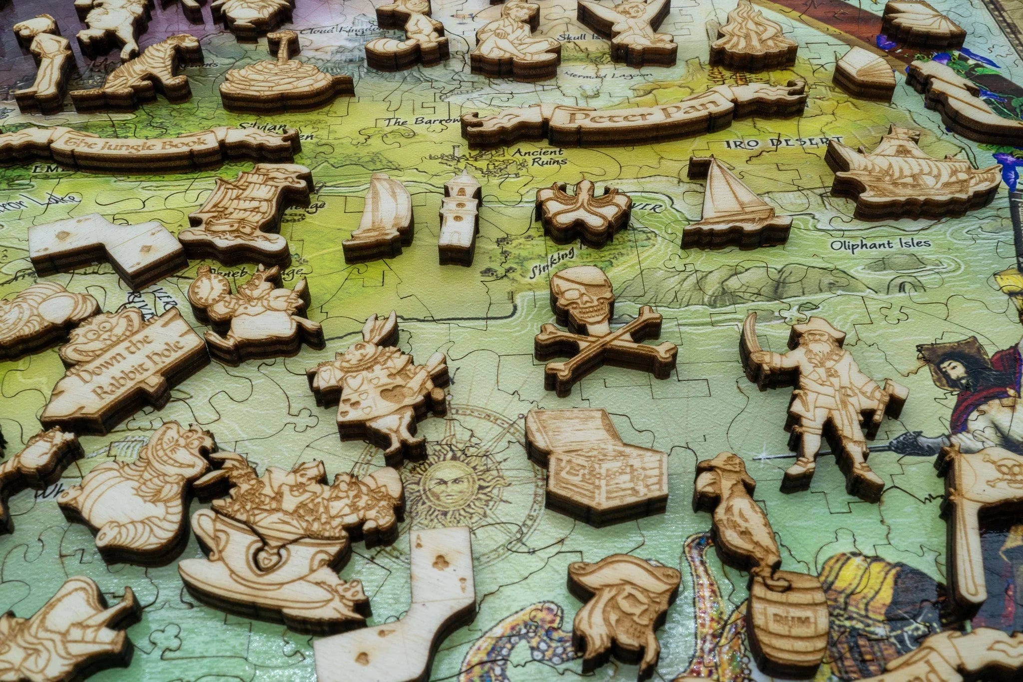 Wooden literary-themed puzzle pieces on a colorful illustrated map background