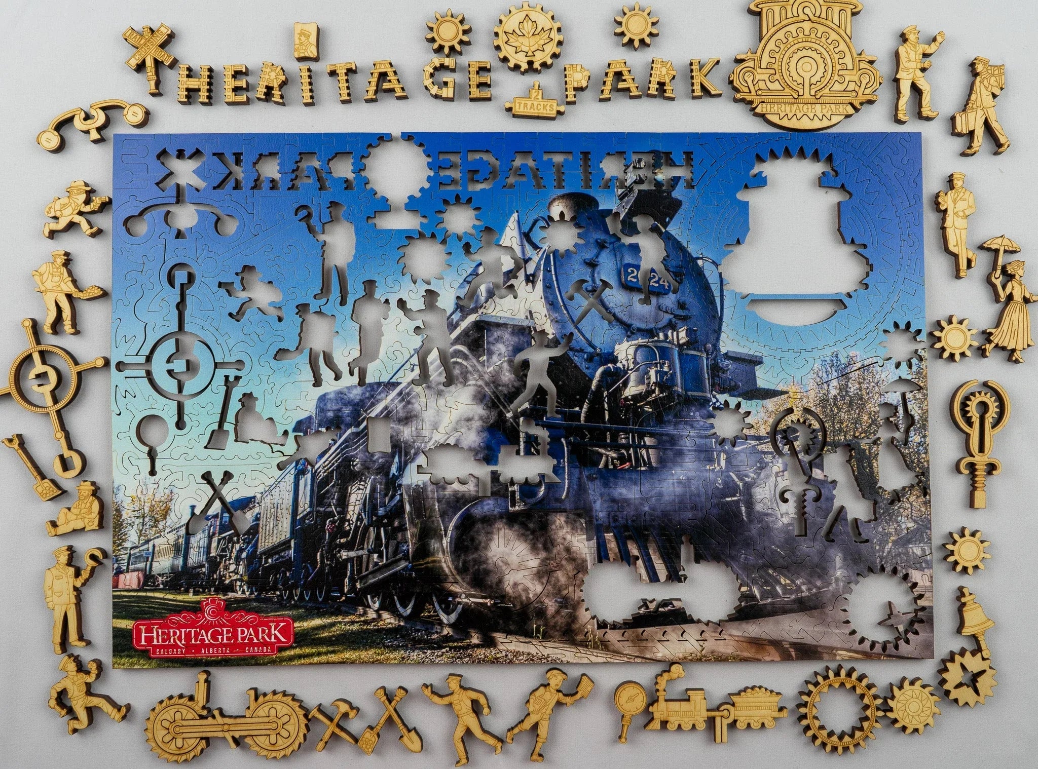Heritage Park steam train puzzle with unique railroad-themed wooden pieces and blue sky