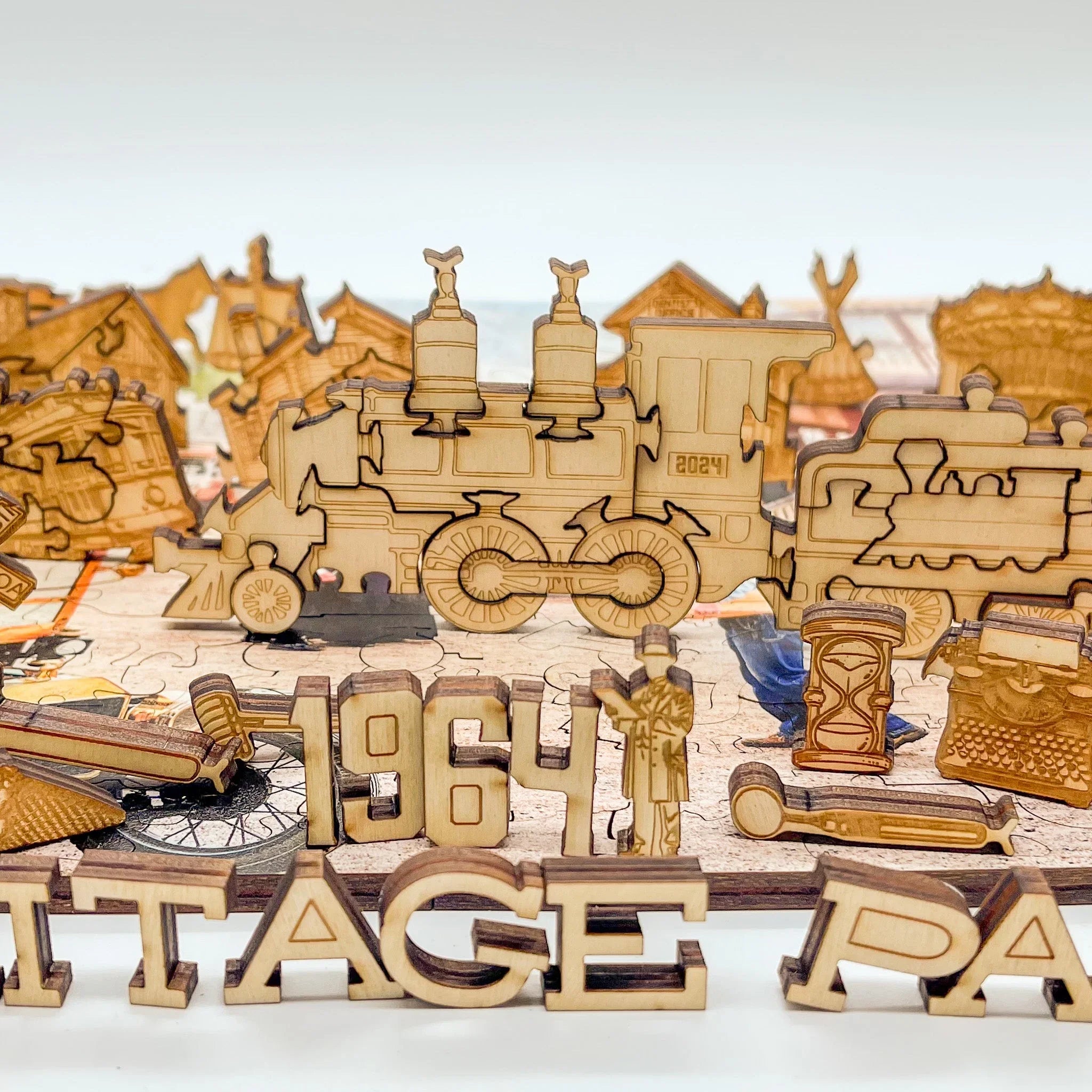 Wooden train puzzle piece with 1864 and heritage theme, detailed laser-cut design.