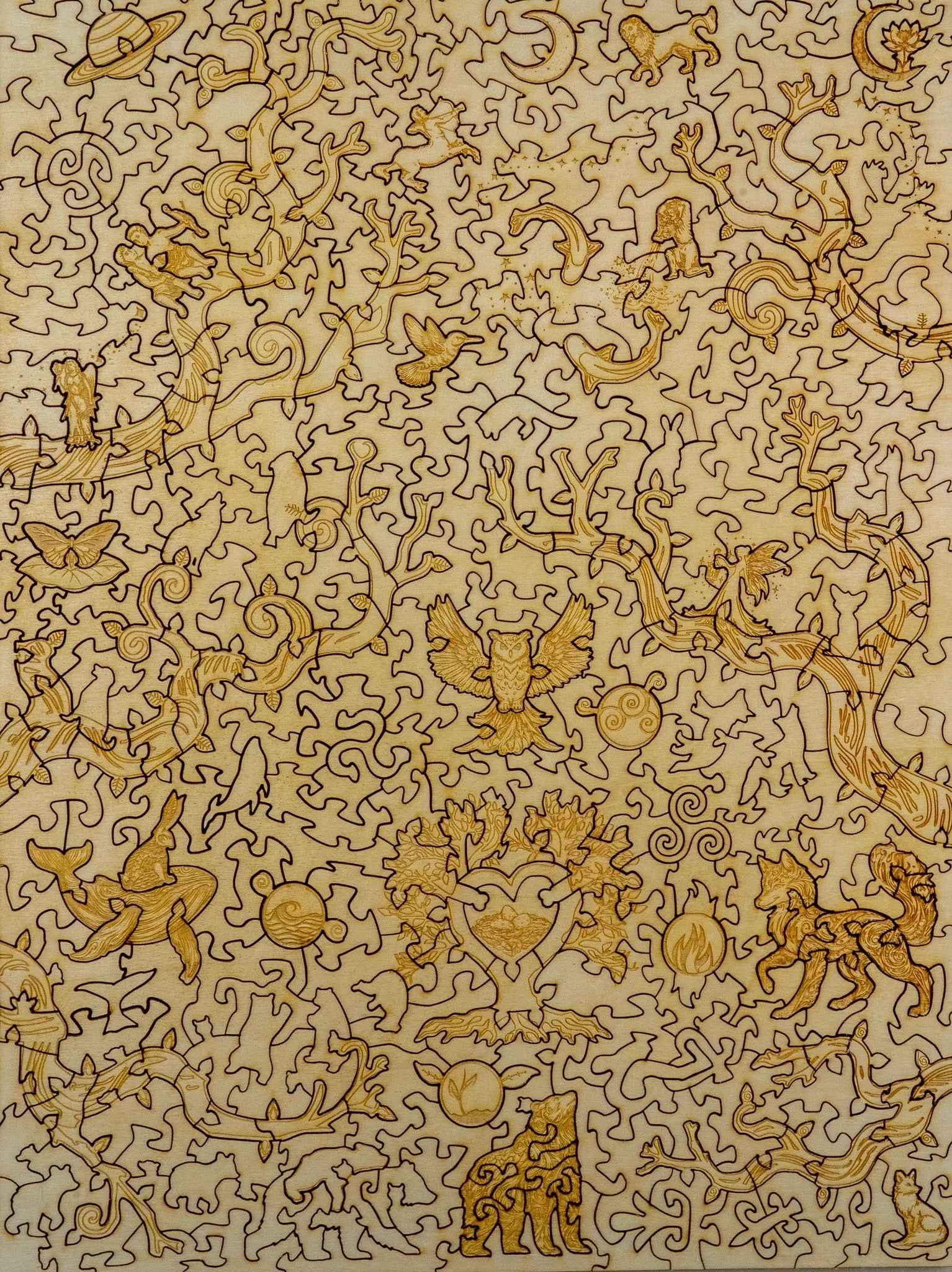 Intricate wooden jigsaw puzzle with whimsical shapes, animals, and nature-themed laser cut patterns