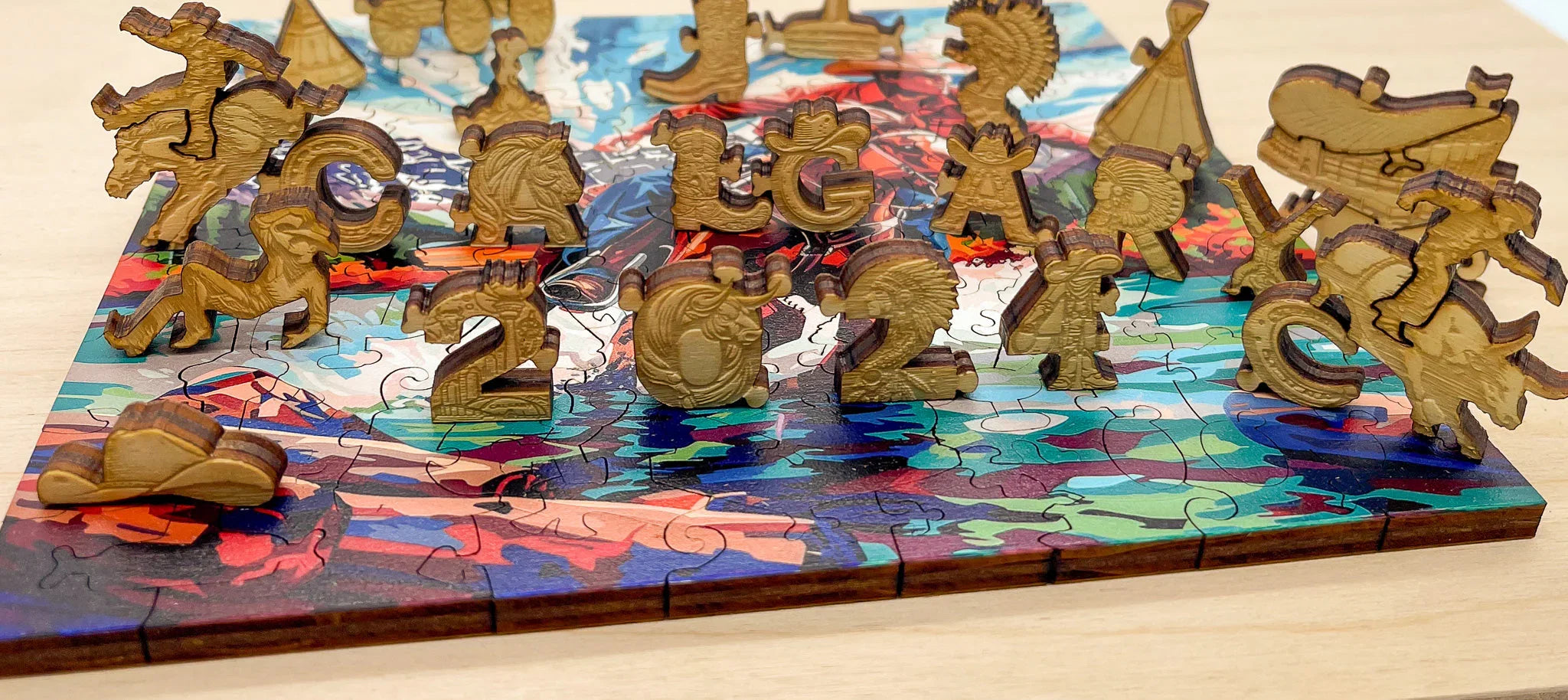 Colorful wooden puzzle with 3D cowboy and western themed pieces standing on top
