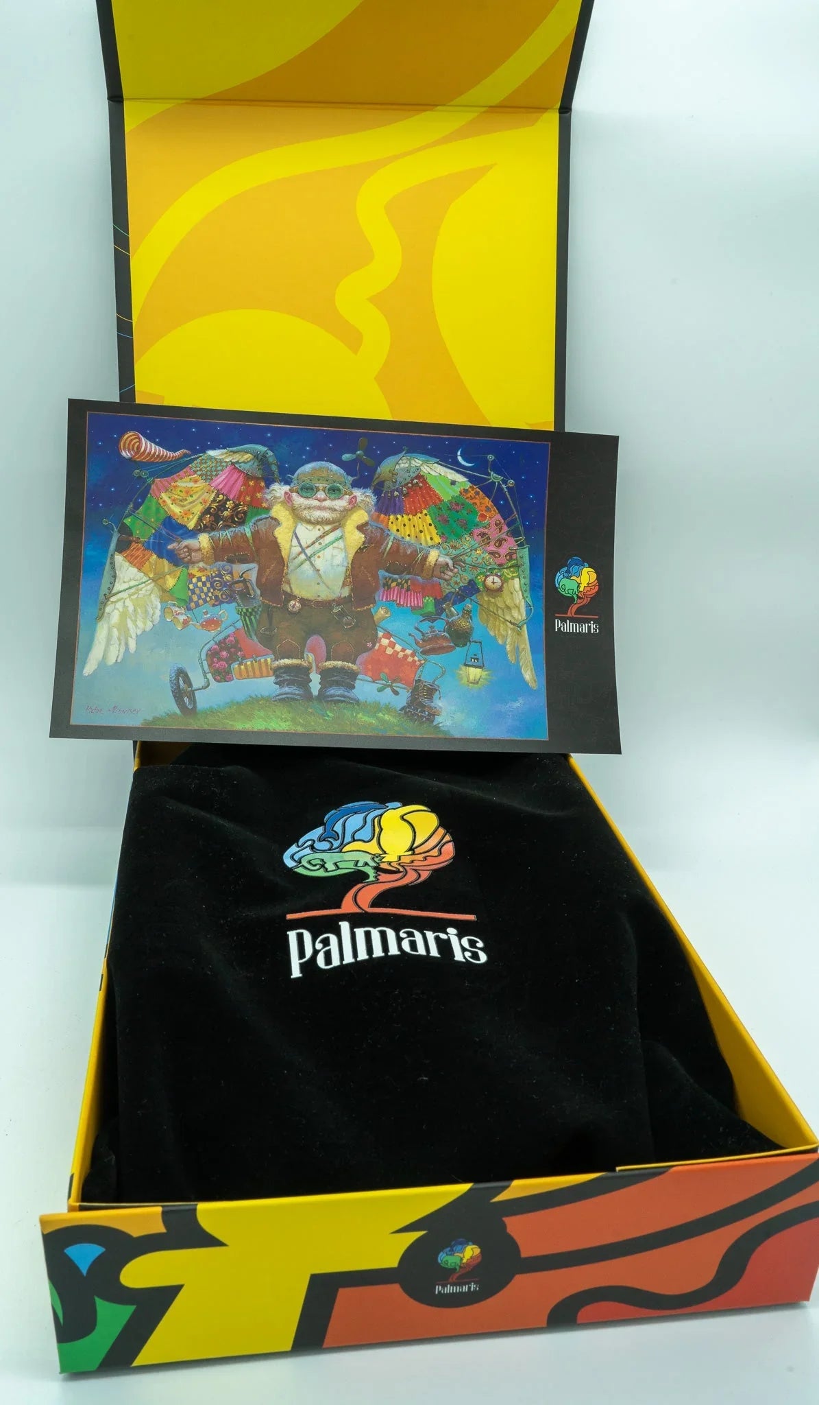Palmaris colorful gift box with velvet pouch and illustrated card featuring a winged figure