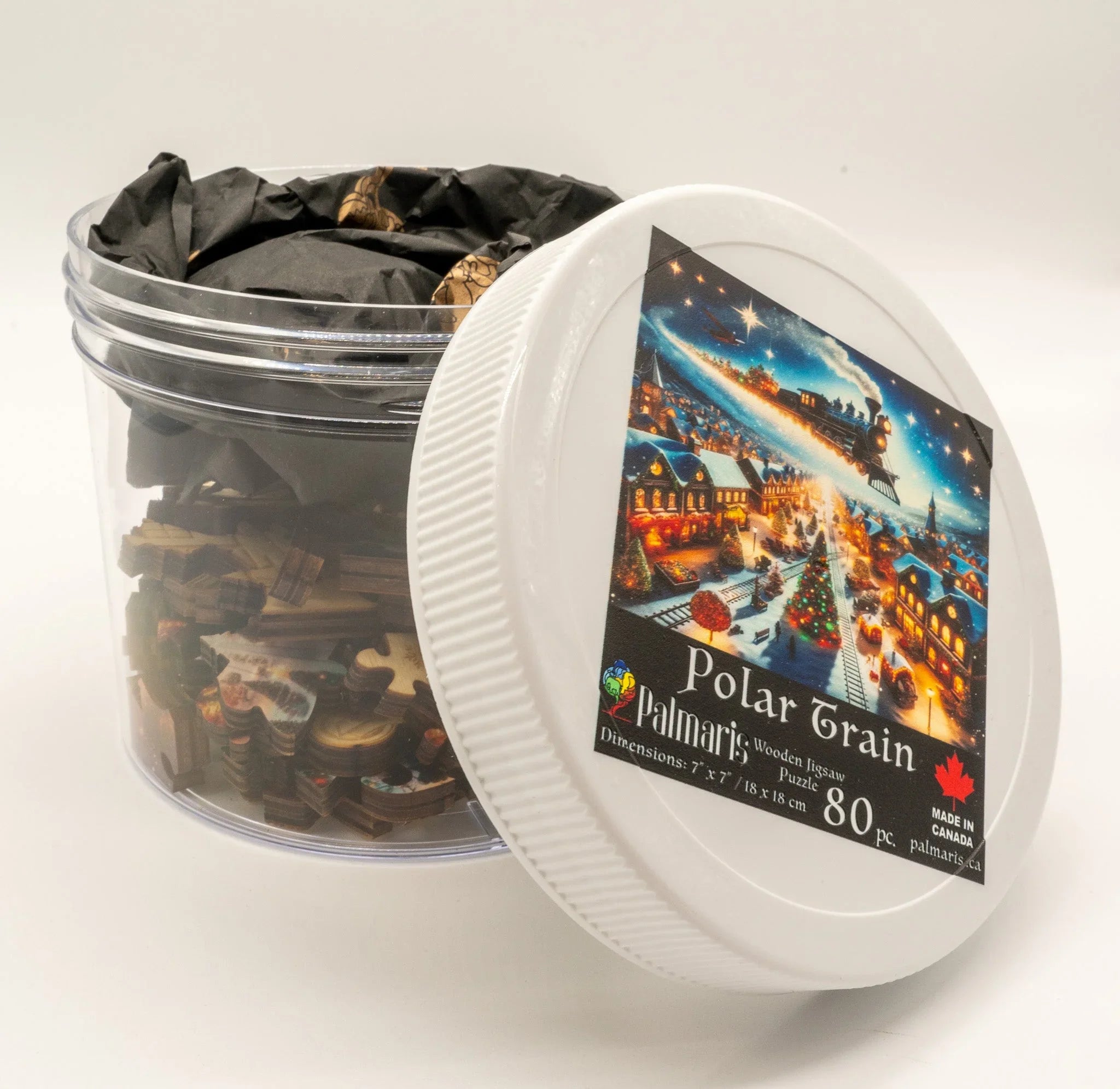 Polar Train wooden jigsaw puzzle in clear container with festive town label