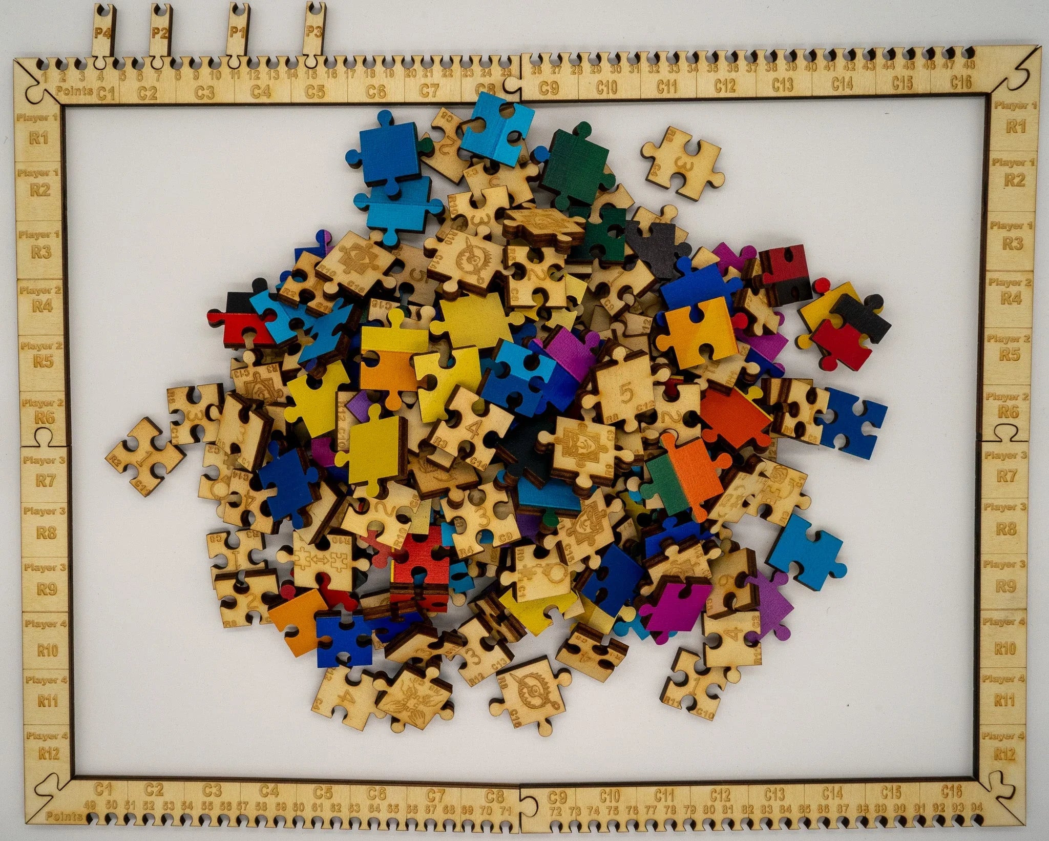 Colorful wooden jigsaw puzzle pieces on a laser-engraved wooden game board