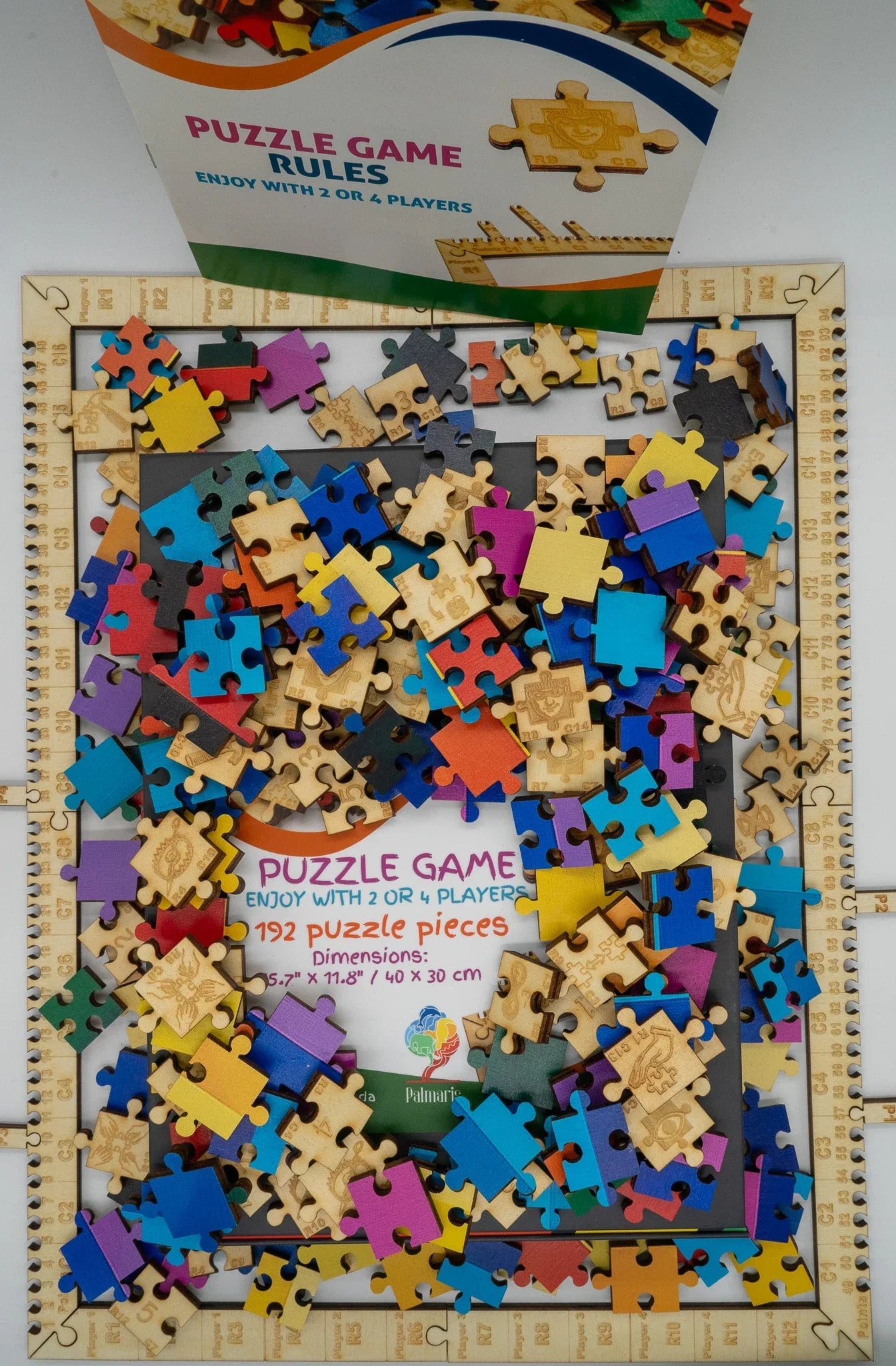 Colorful wooden puzzle pieces and puzzle game rules sheet on white background