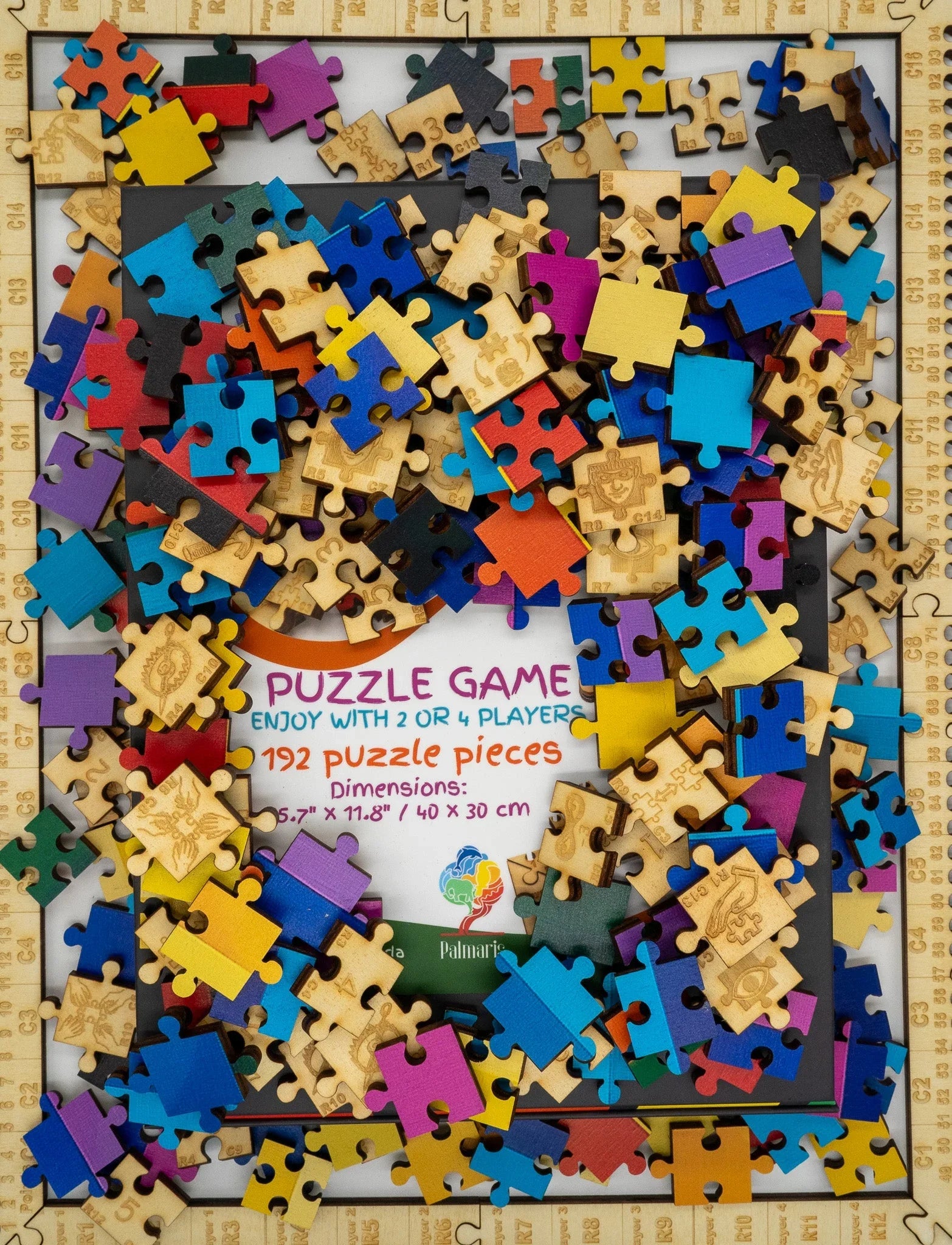 Colorful wooden puzzle pieces scattered on a puzzle game box with 192 pieces, framed by a ruler.
