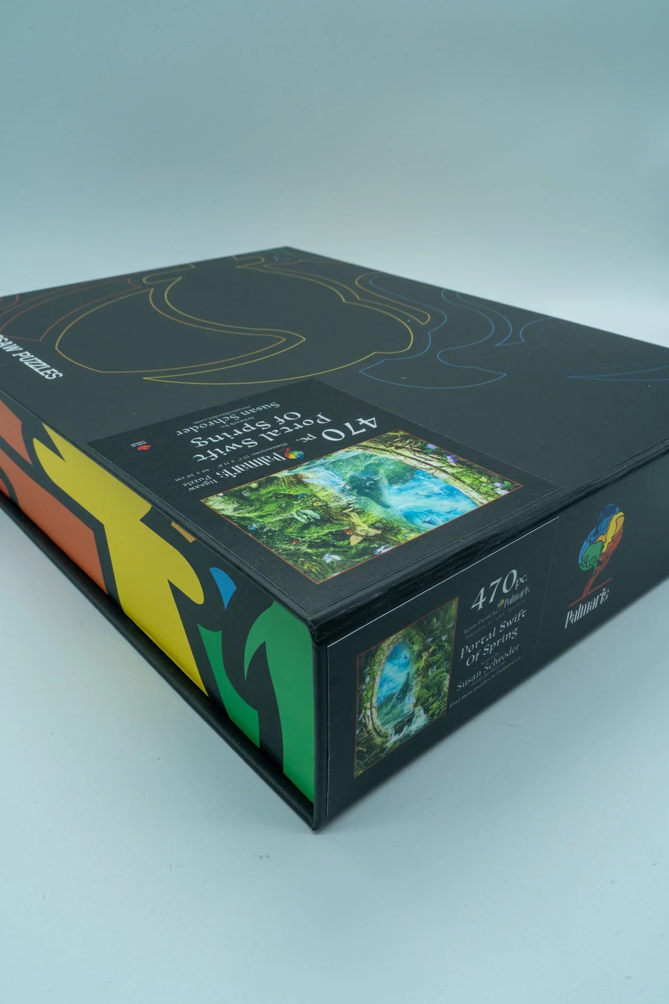 470 piece Portals Swift of Spring puzzle box with colorful patterns and forest scene