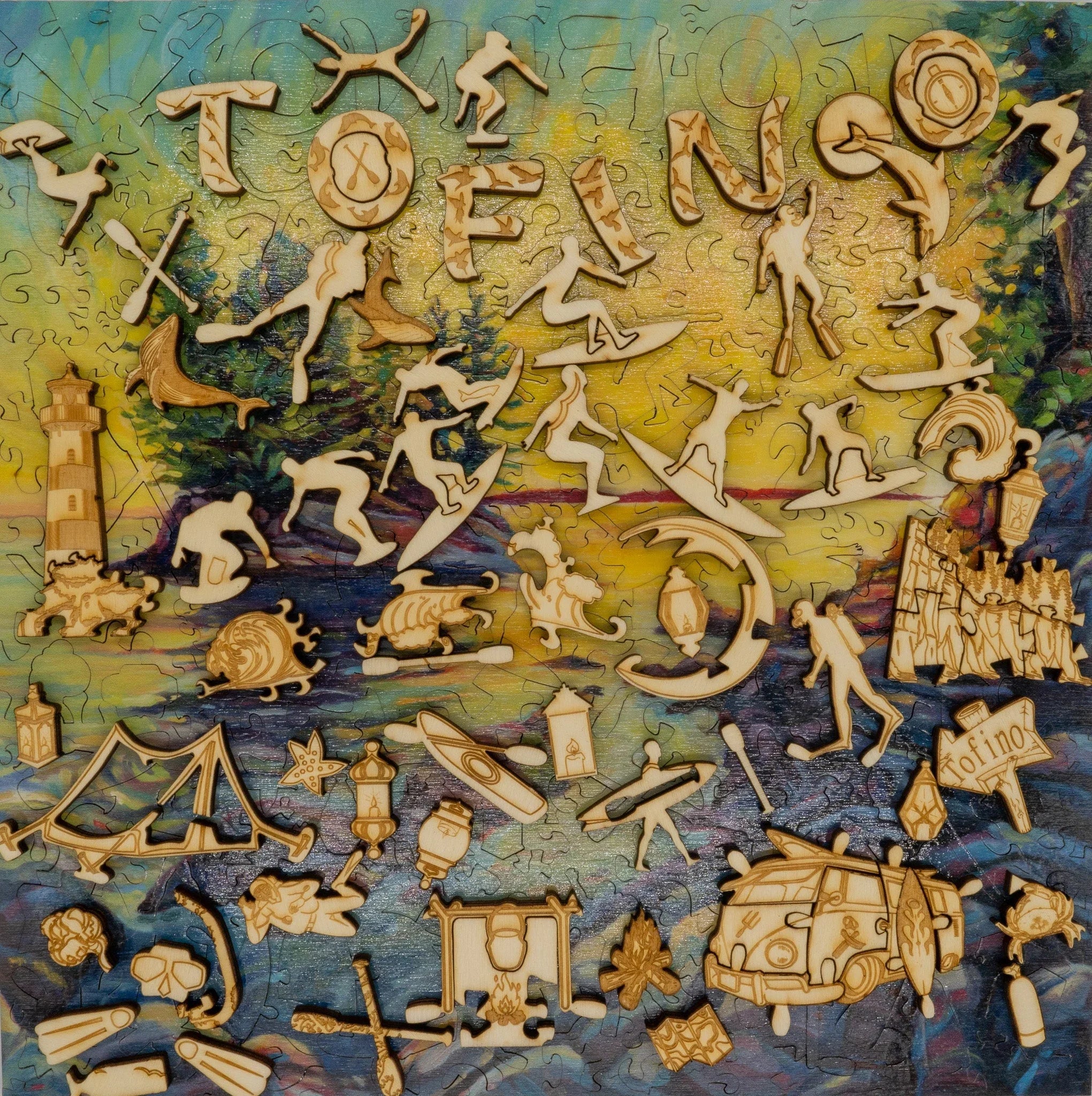 Wooden puzzle pieces with surfing, lighthouse, camp, and Tofino-themed designs on colorful background