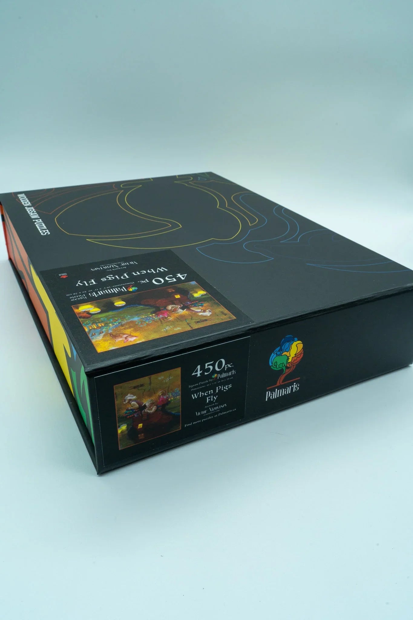 Pallmart's 450 piece jigsaw puzzle box, When Pigs Fly, black packaging on white background