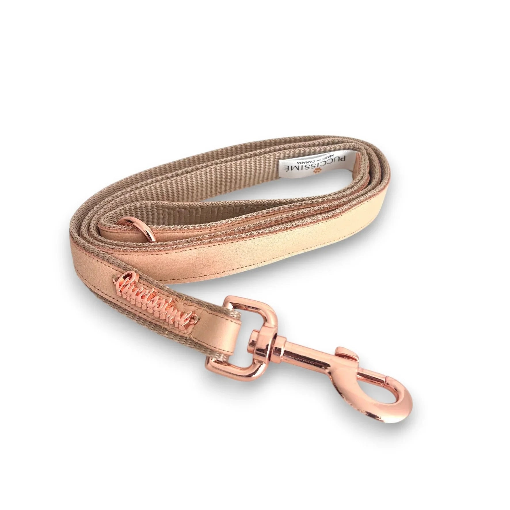 Rose gold reflective dog leash with metal clip on white background
