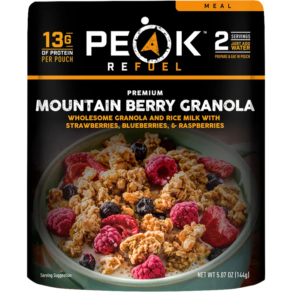 Peak Refuel Mountain Berry Granola pouch with strawberries, blueberries, raspberries