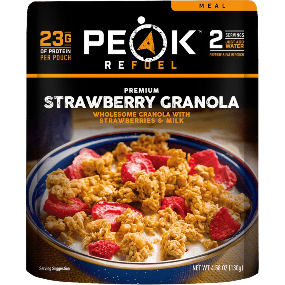 Peak Refuel Strawberry Granola pouch with granola, strawberries, and milk in a bowl