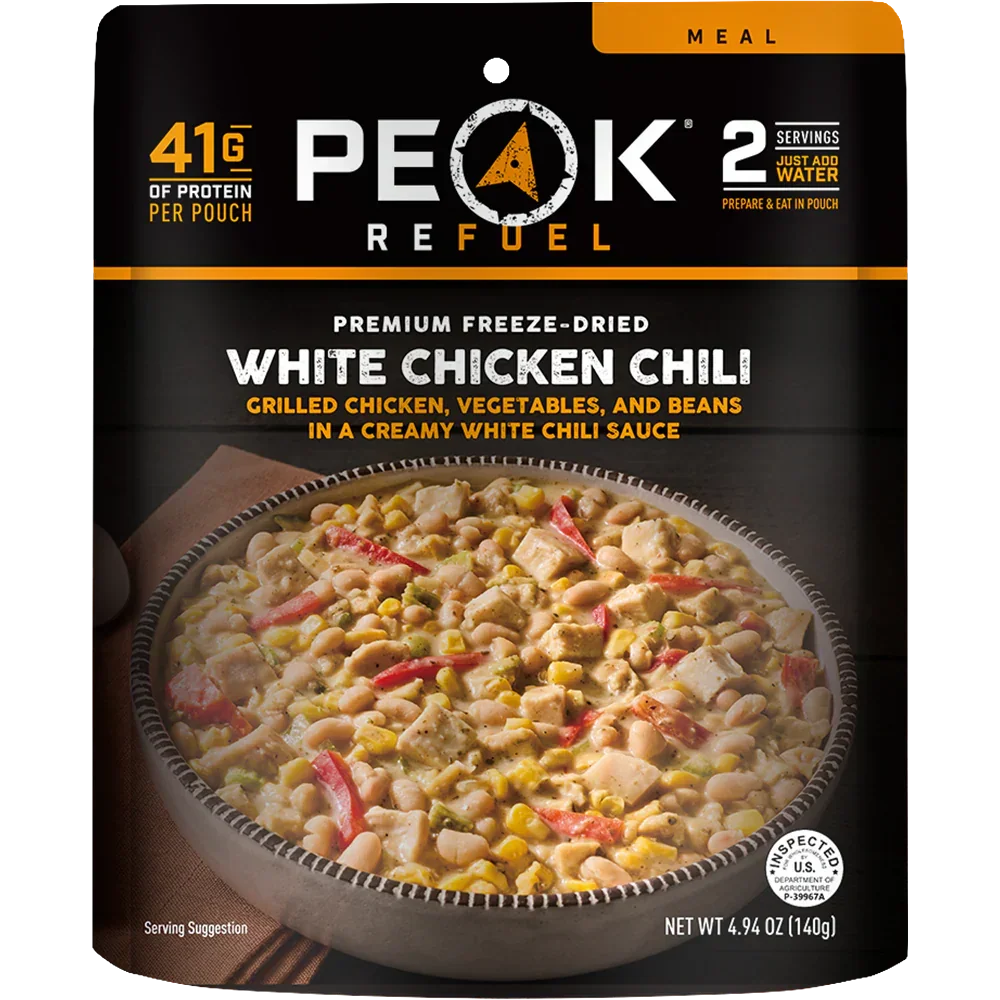 Peak Refuel White Chicken Chili freeze-dried meal pouch with chili bowl image