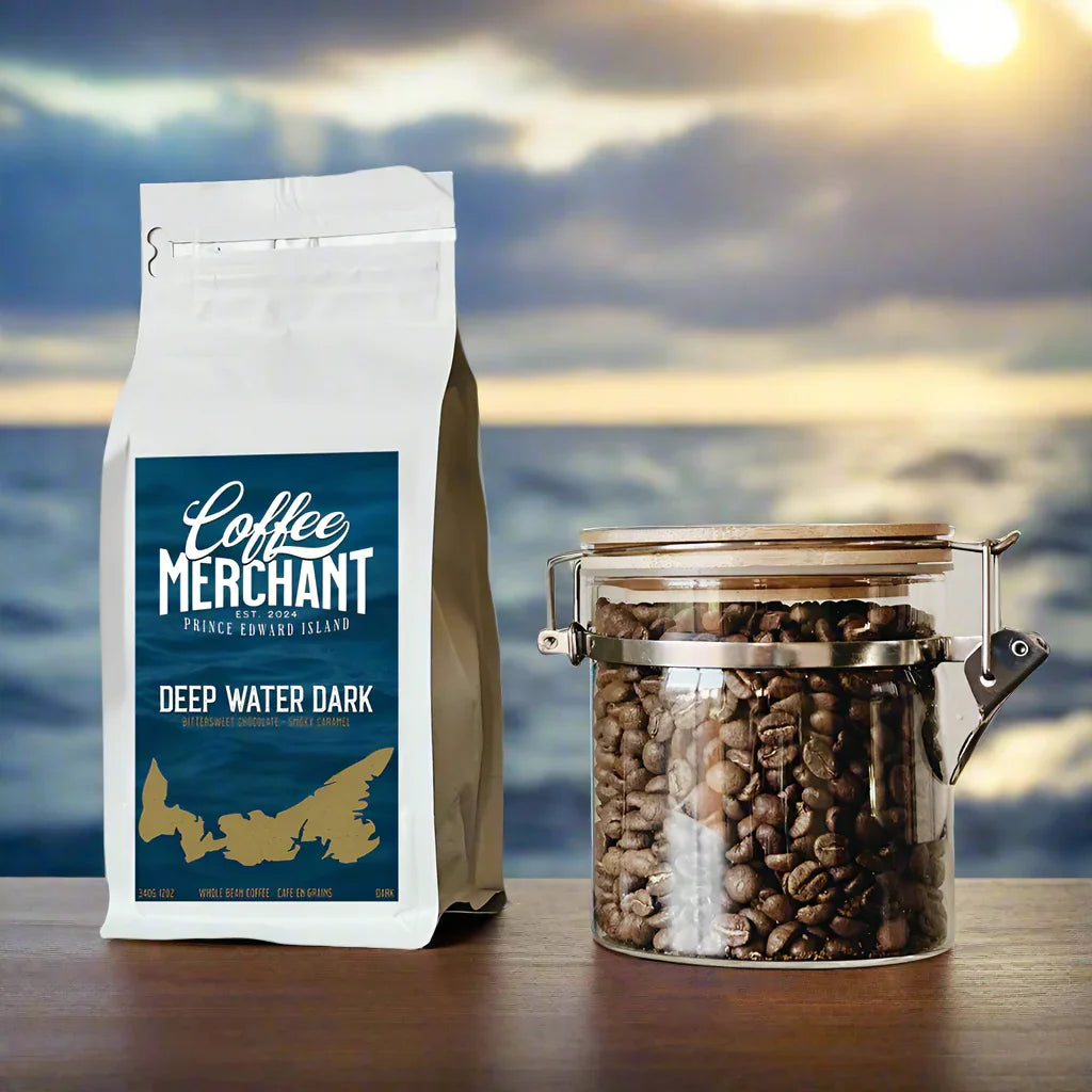 Coffee Merchant Deep Water Dark coffee bag and jar of coffee beans on table with ocean sunset background