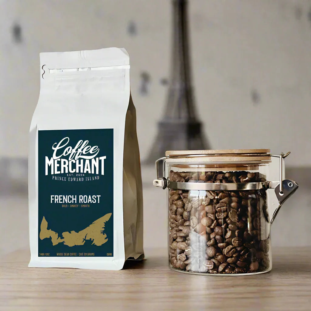 Coffee Merchant French Roast whole bean coffee bag beside jar of coffee beans on table