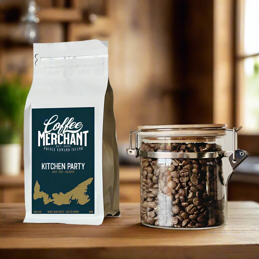 Coffee Merchant Kitchen Party whole bean coffee bag and glass jar of coffee beans on wood table