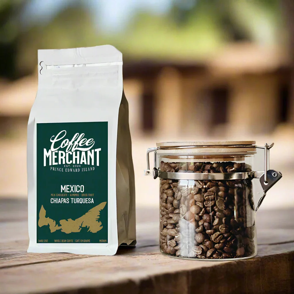 Coffee Merchant Mexico Chiapas Turquesa whole bean coffee bag and jar of coffee beans on table