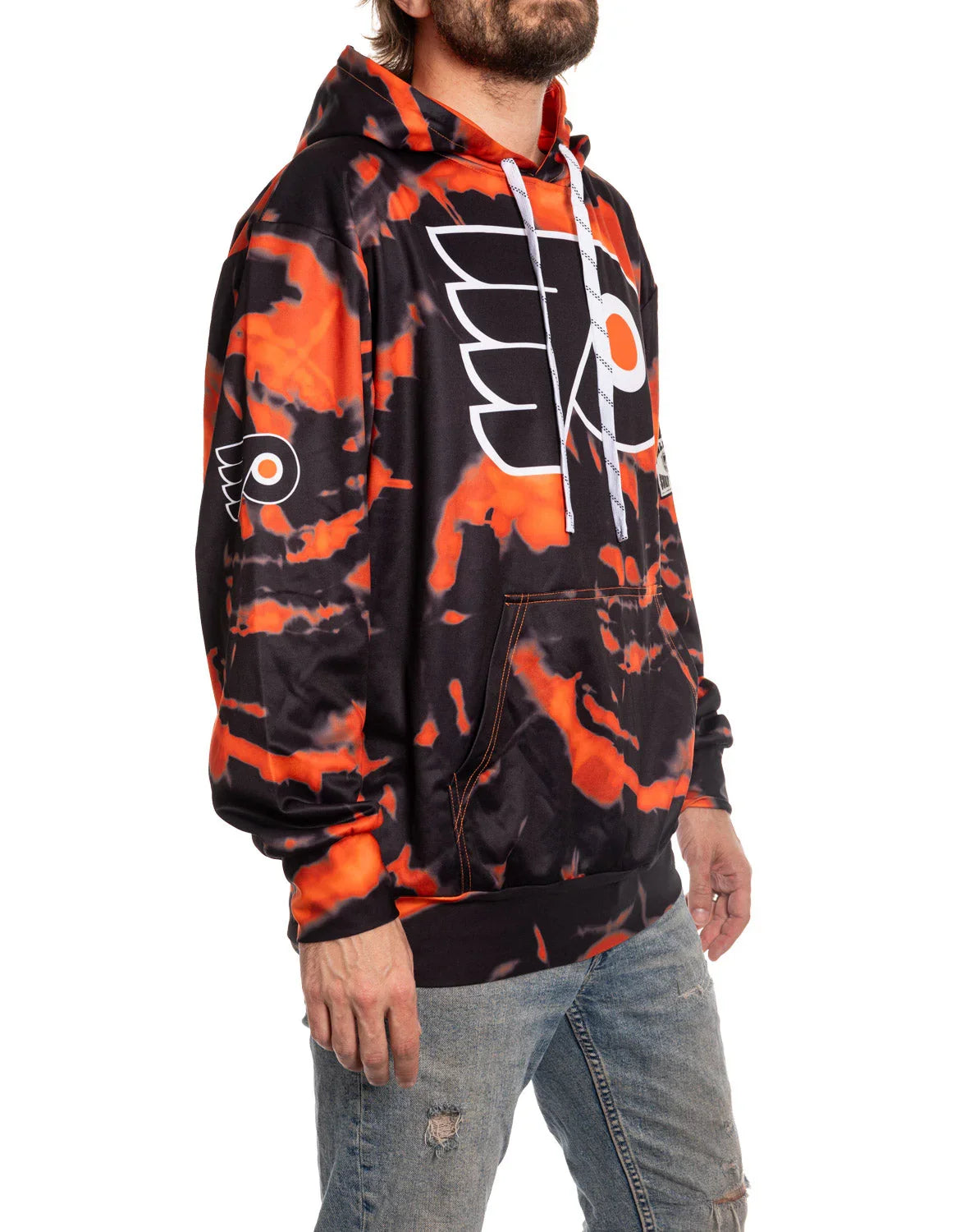 Man wearing Philadelphia Flyers black and orange tie dye sublimation hoodie with logo