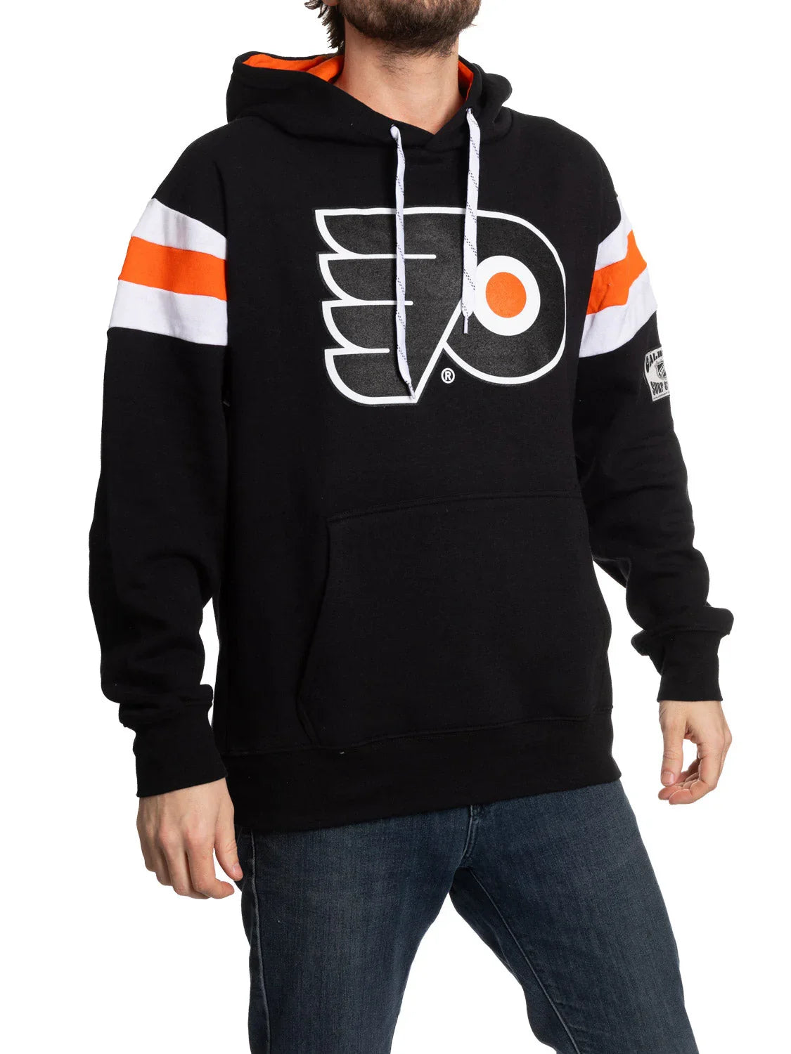 Man wearing black Philadelphia Flyers hoodie with orange and white stripes, front logo visible