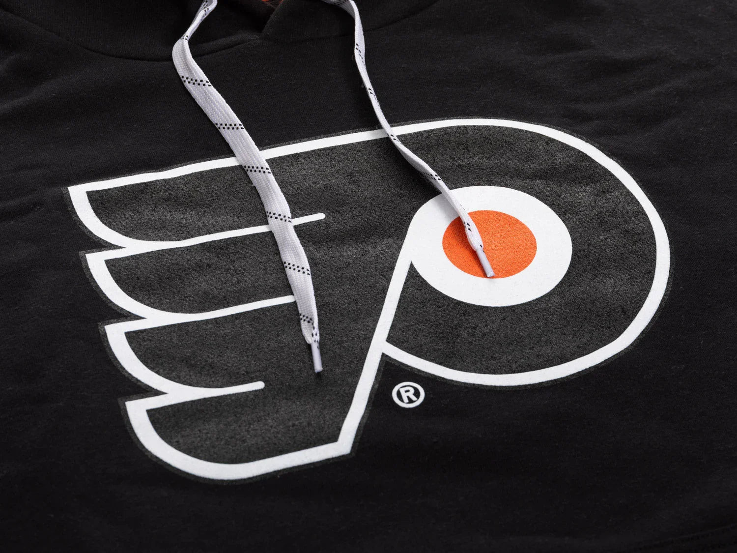 Black hoodie with large Philadelphia Flyers logo and white drawstrings