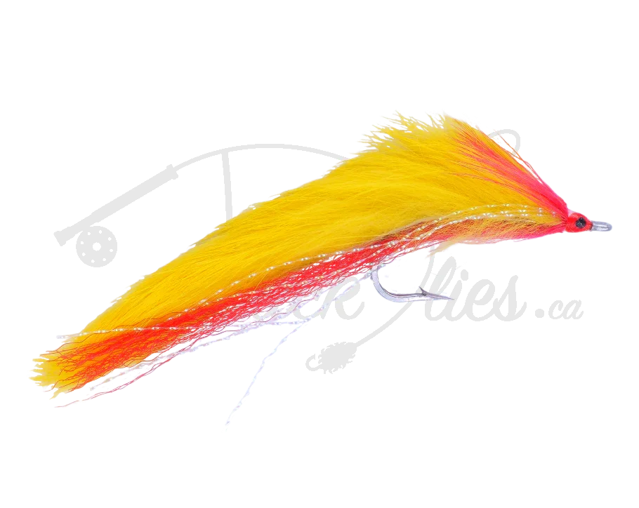 Yellow and red pike fishing fly with synthetic fibers and a silver hook on white background