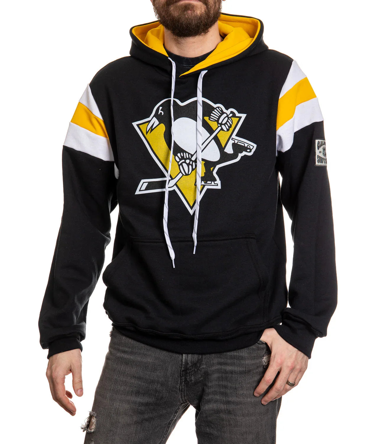 Man wearing black Pittsburgh Penguins hoodie with yellow and white accents and logo