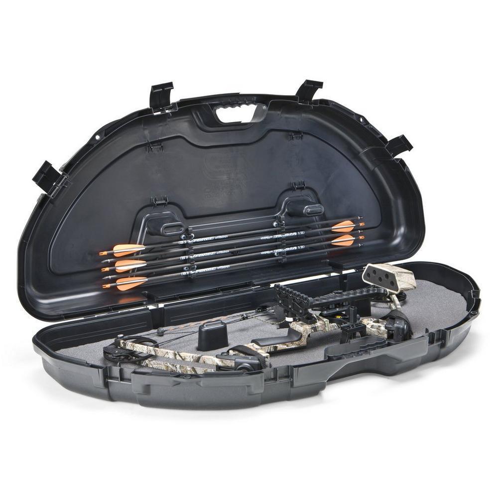 Plano Protector Series compact bow case with arrows and camo compound bow inside