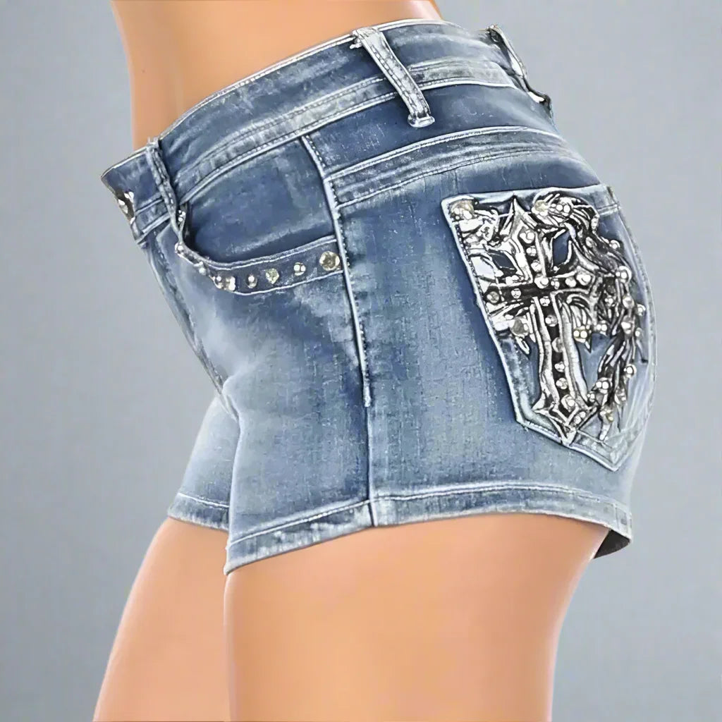 Women's denim shorts with rhinestone cross angel wing design on back pocket