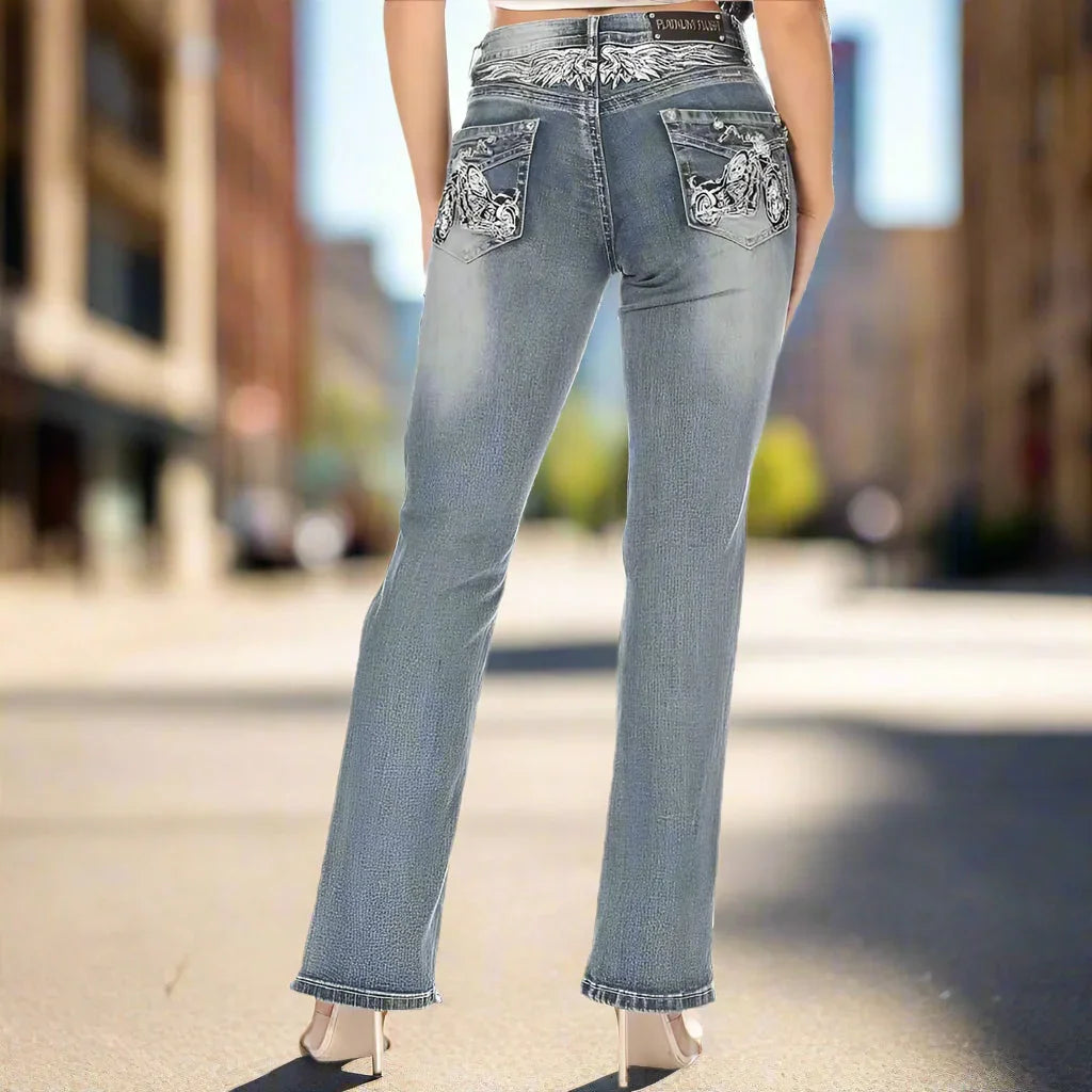 Platinum Plush women's motorcycle bootcut jeans with embroidered back pockets, street view