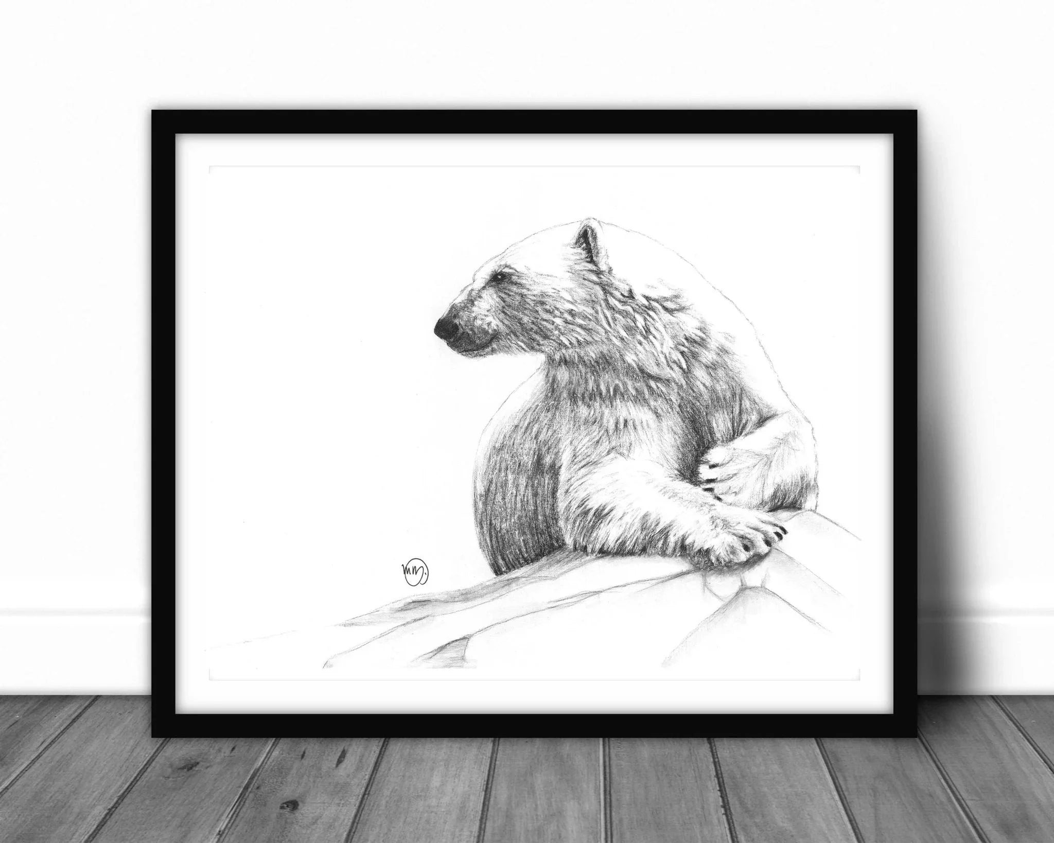 Framed pencil drawing of a polar bear sitting on a rock, minimalist wall art