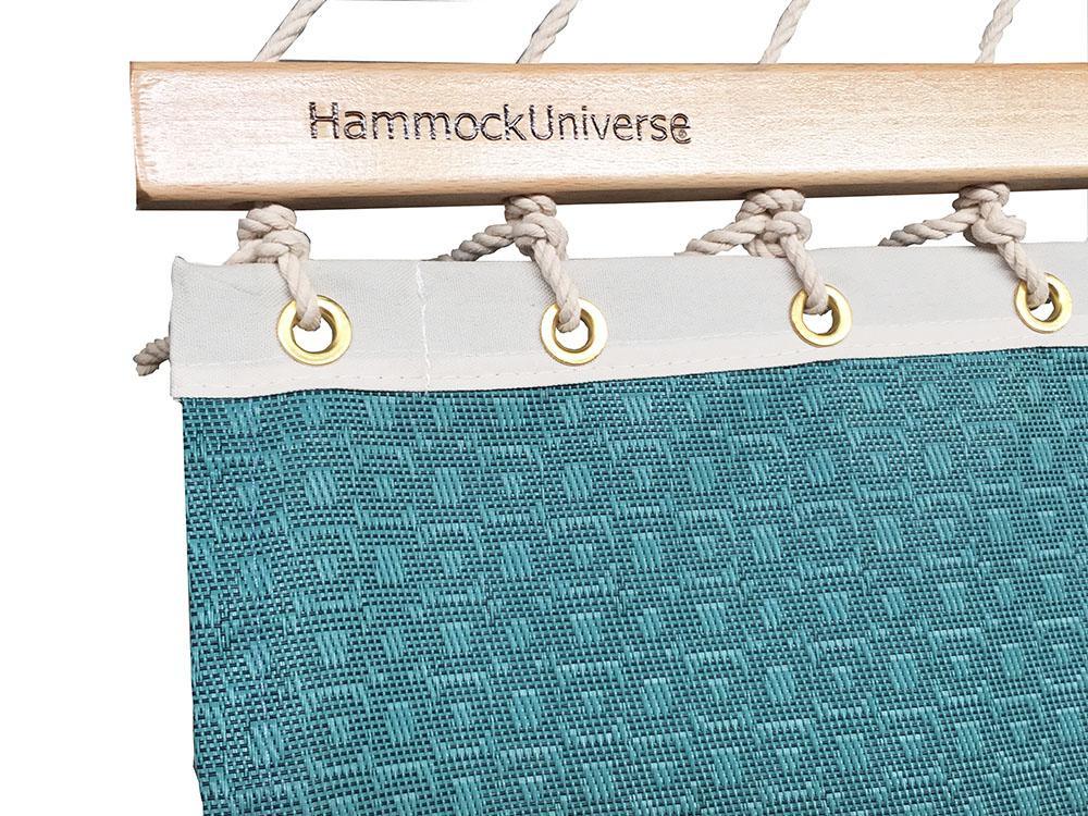 Closeup of light blue poolside double hammock fabric, wood spreader bar engraved HammockUniverse