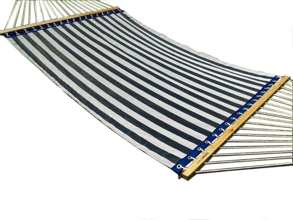 White and blue striped poolside hammock with wooden spreader bars