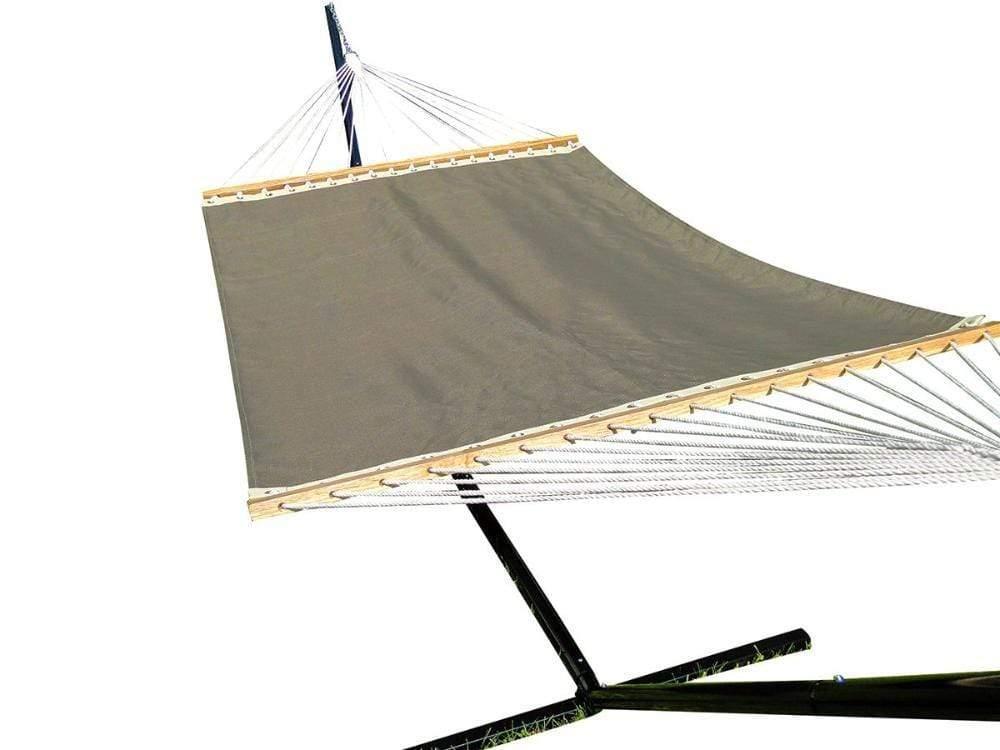 Outdoor sawgrass hammock with spreader bars on a black steel stand